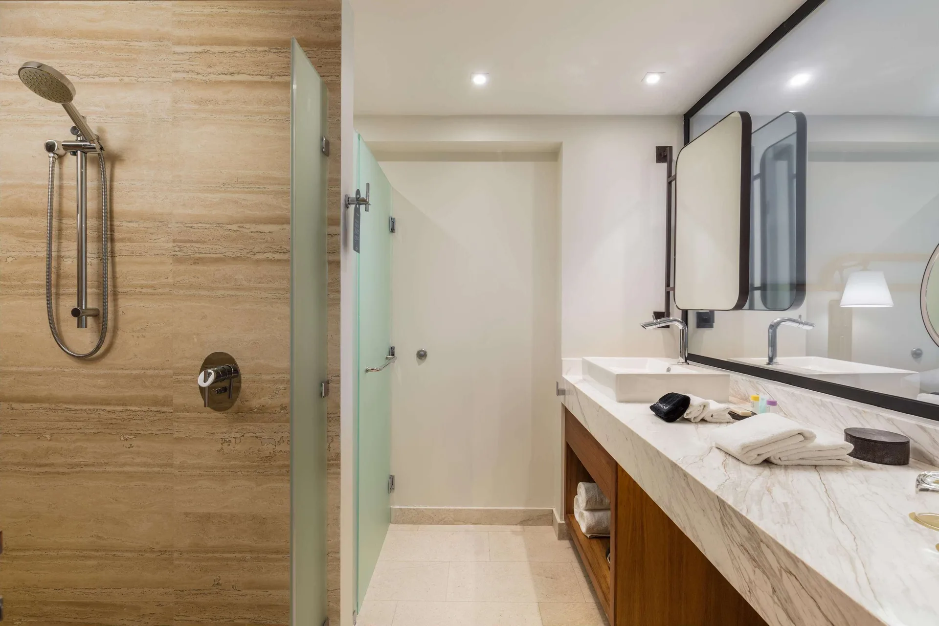 Infinity Ocean View bathroom with shower and marble vanity at Corazón Cabo.