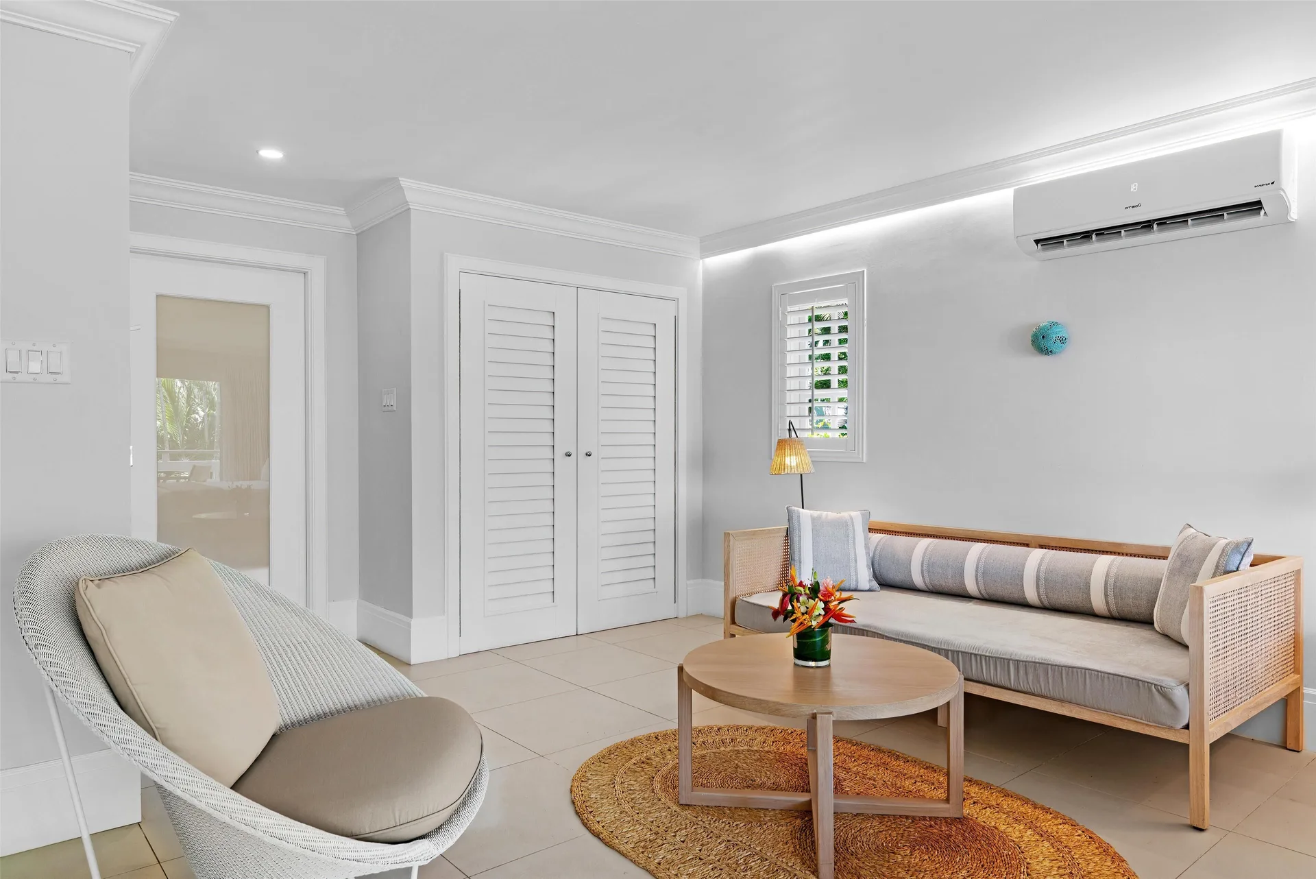 Penthouse Ocean Suite lounge seating and closet doors at Couples Sans Souci.