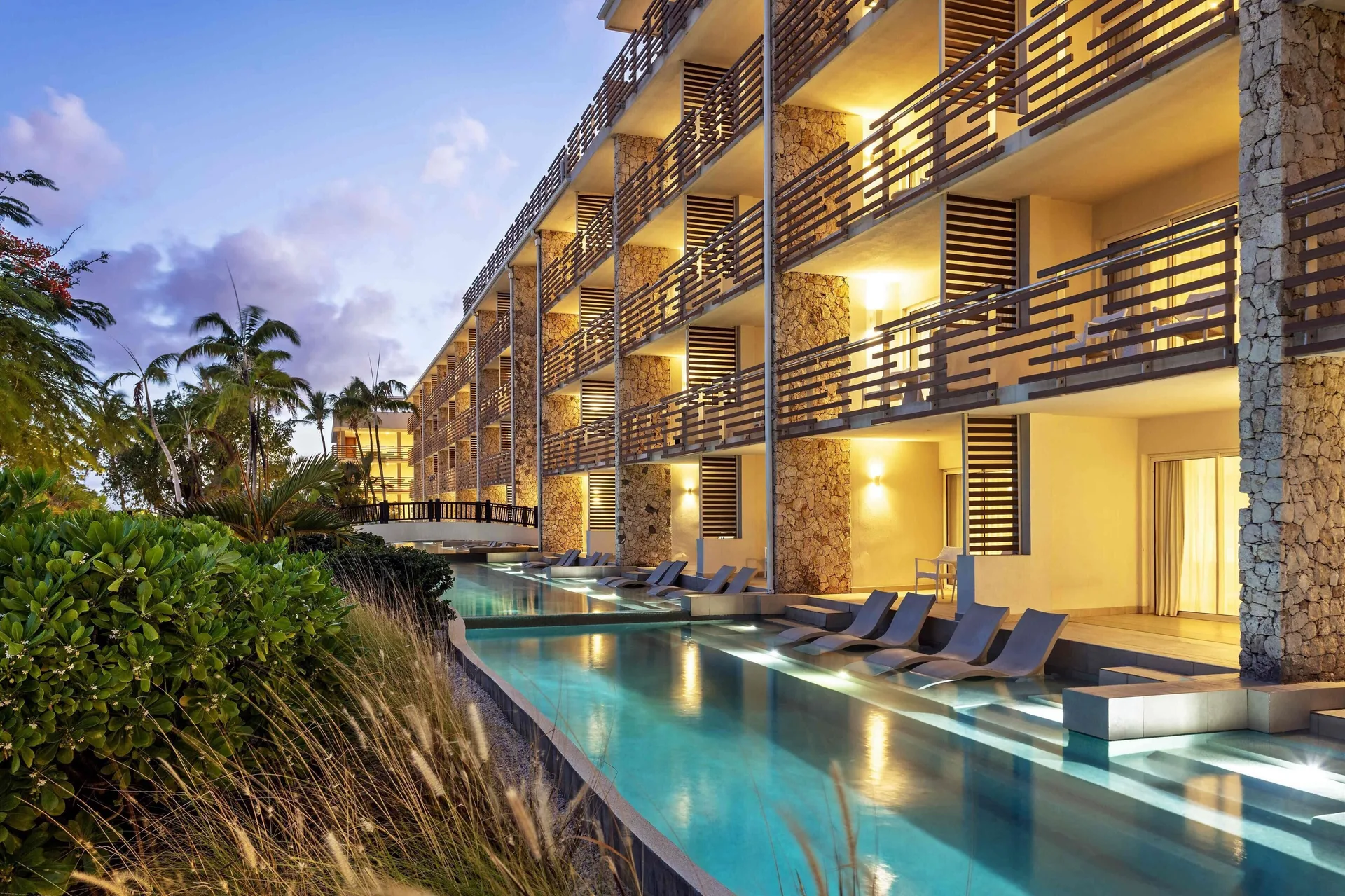Sonesta Ocean Point adults-only all-inclusive resort in St. Maarten with oceanfront suites and infinity pool overlooking Maho Beach.