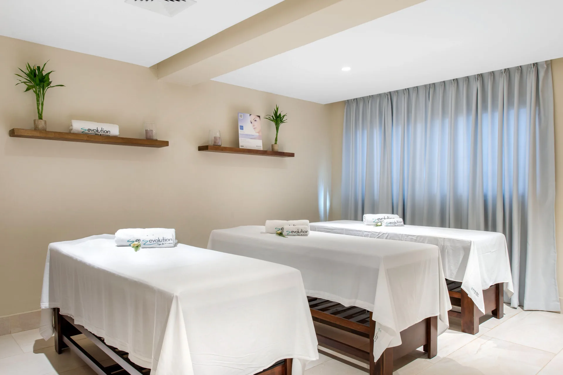 Spa treatment room with three massage tables at Emotions by Hodelpa Puerto Plata.