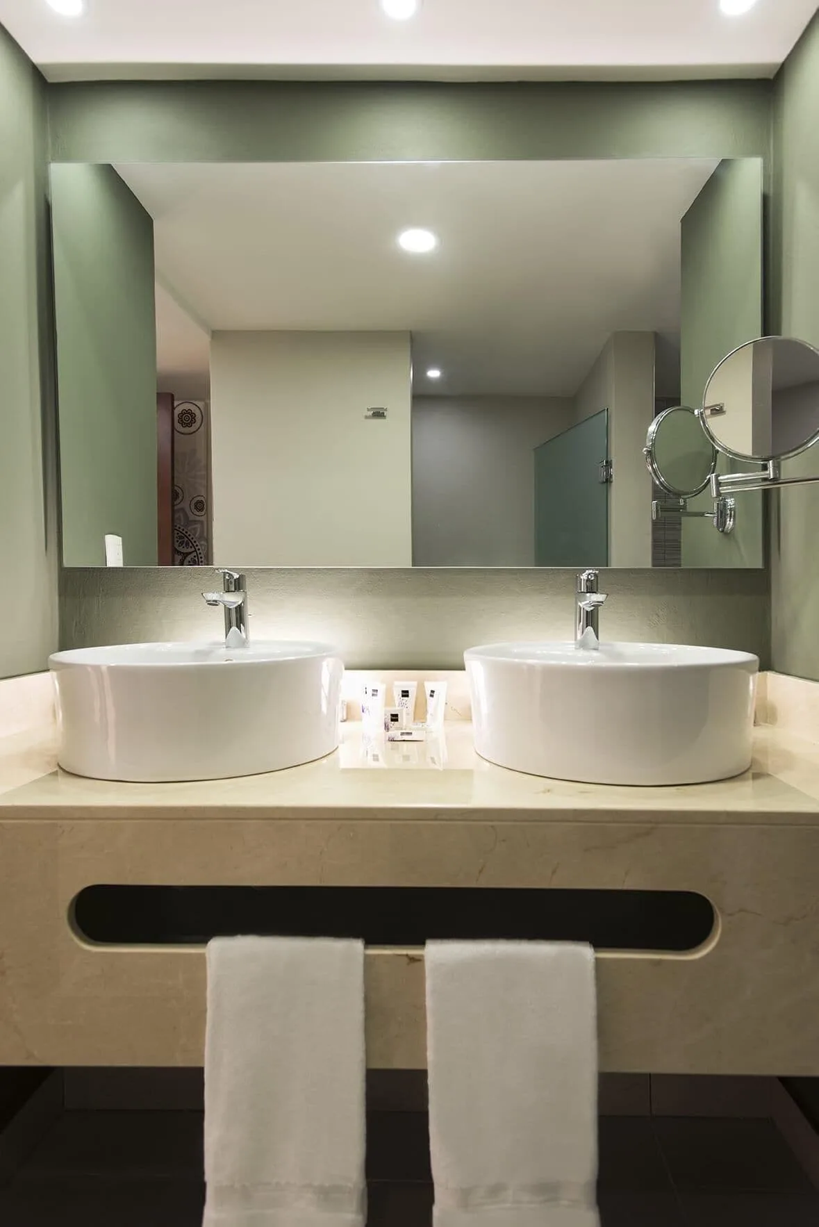 Family Deluxe bathroom vanity with two sinks at Emotions by Hodelpa Puerto Plata.