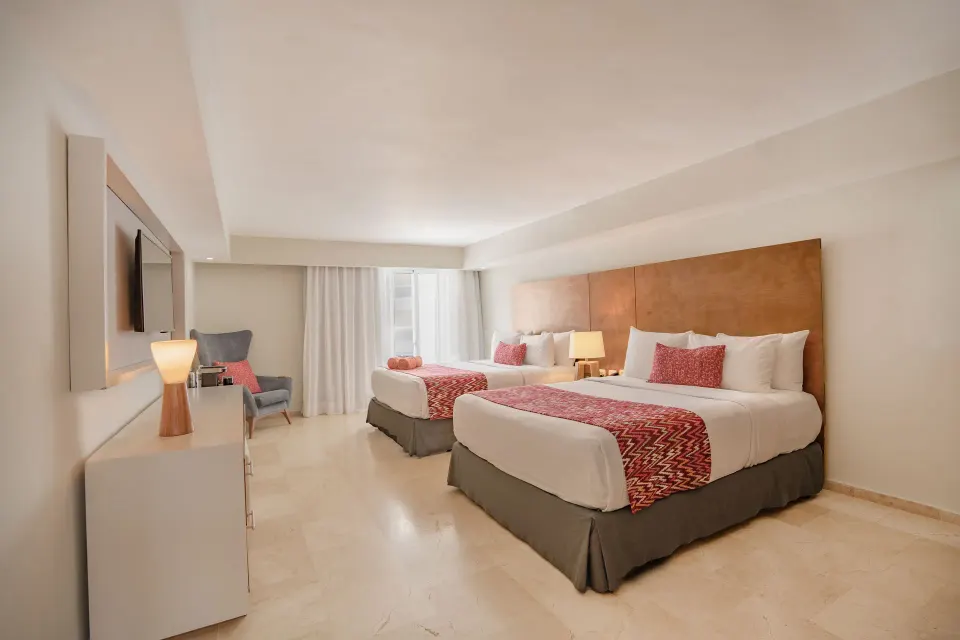 Superior Adults Only room with two beds and wall-mounted TV at Emotions by Hodelpa Puerto Plata.