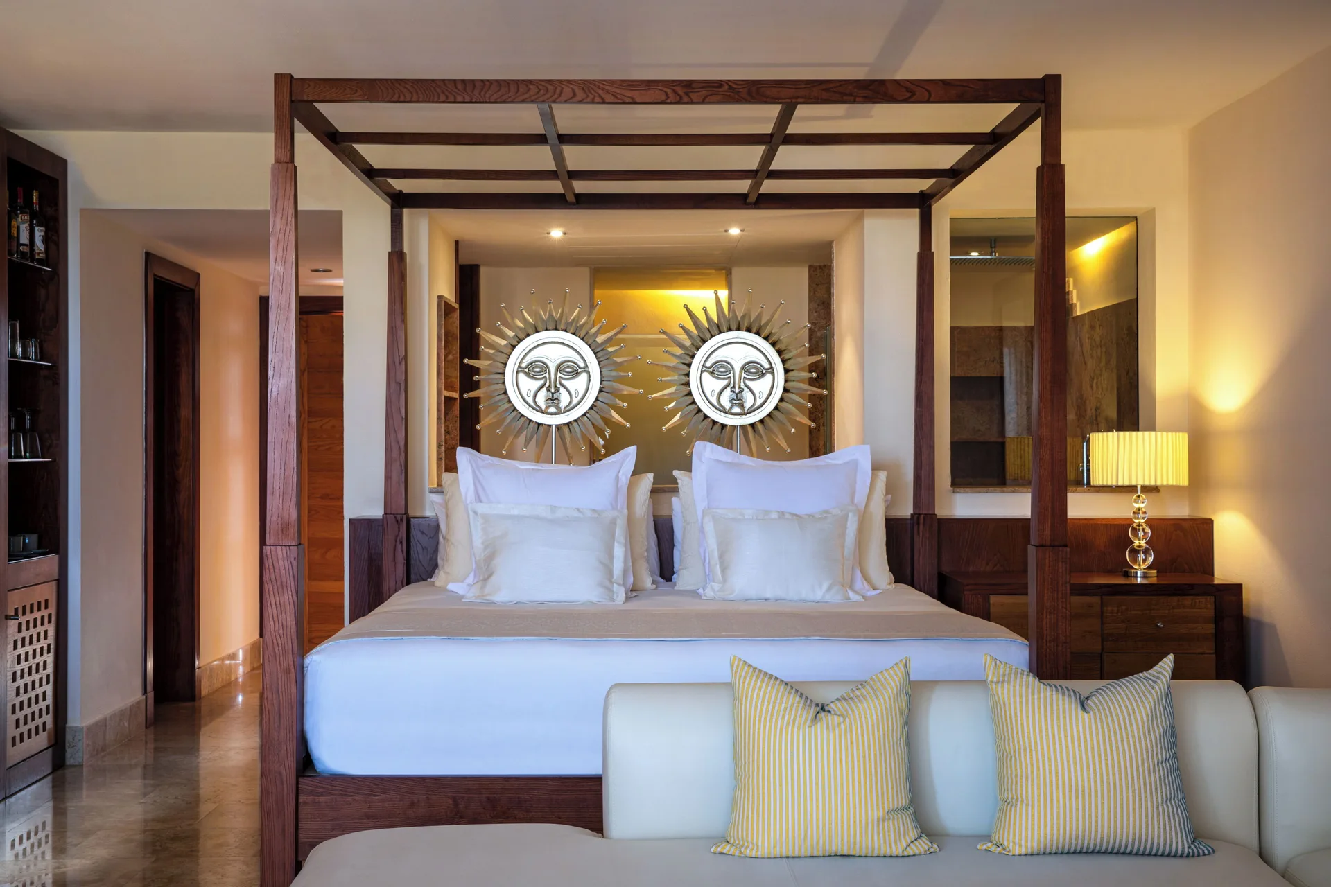 Junior Suite Spa or Pool View king bed and sitting area at Excellence Playa Mujeres.