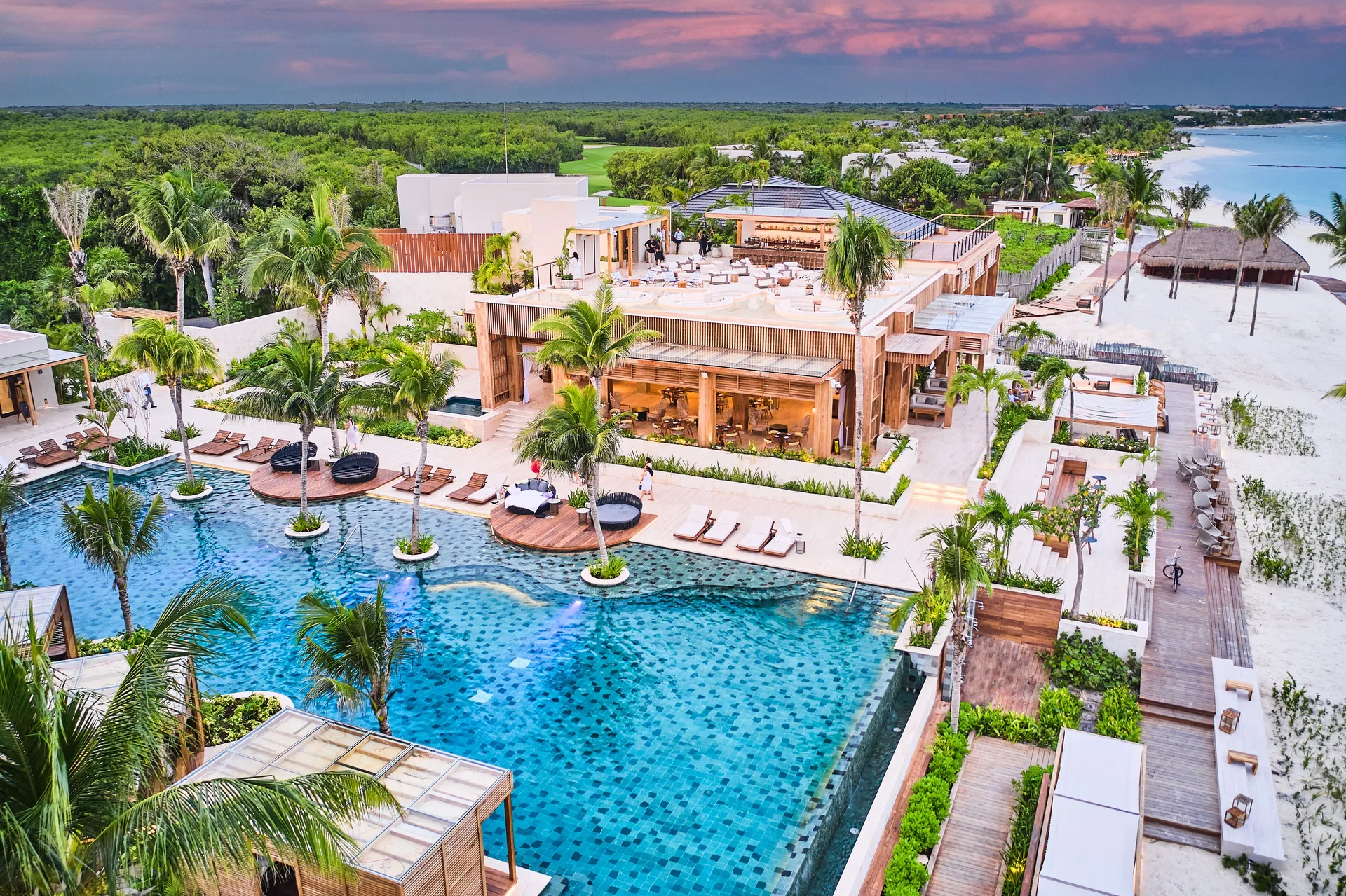 Fairmont Mayakoba luxury resort with beachfront pools, casitas, and lush tropical grounds in Riviera Maya, Mexico.