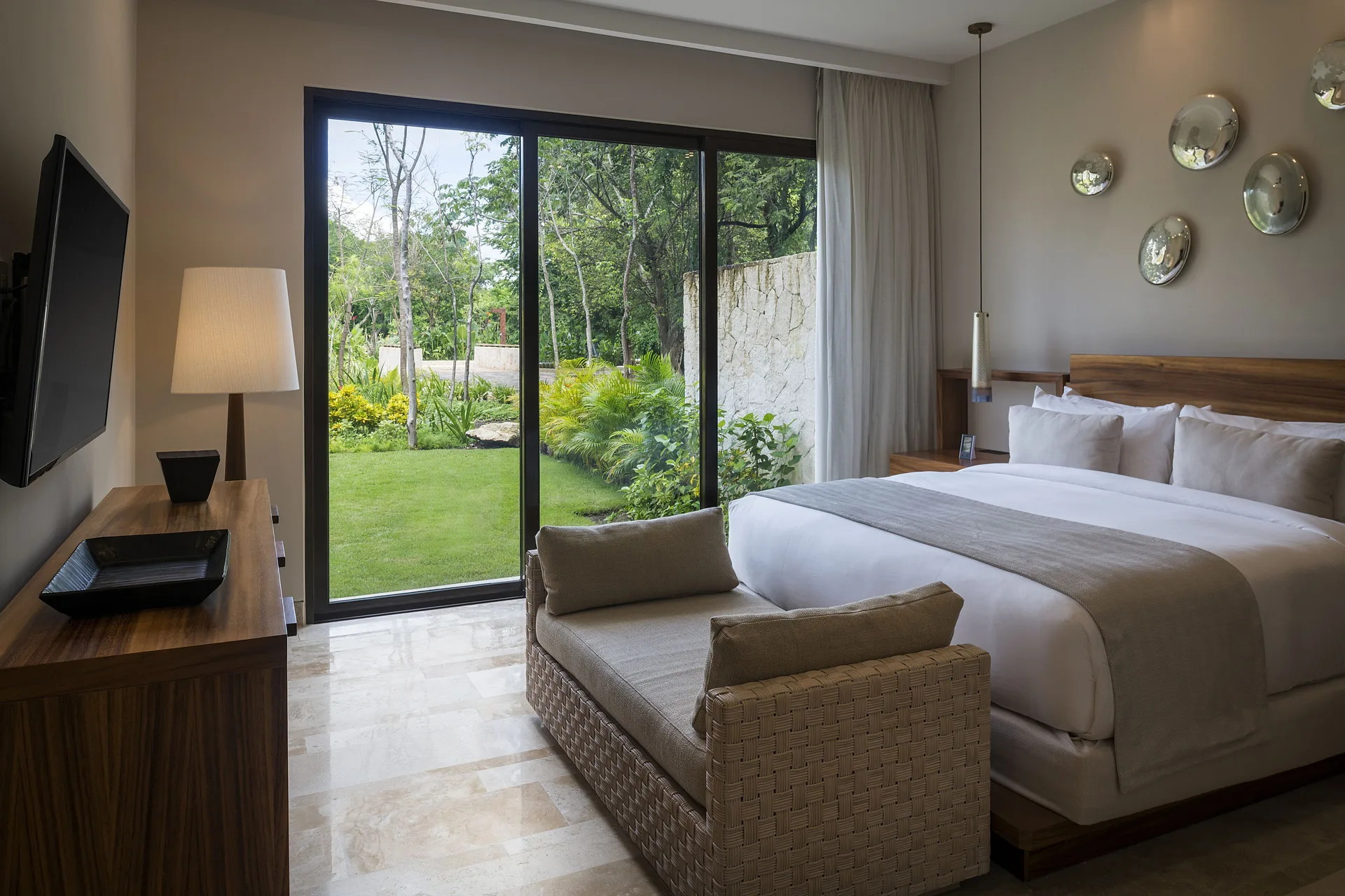 Garden-view king bedroom at Fairmont Heritage Place Mayakoba.