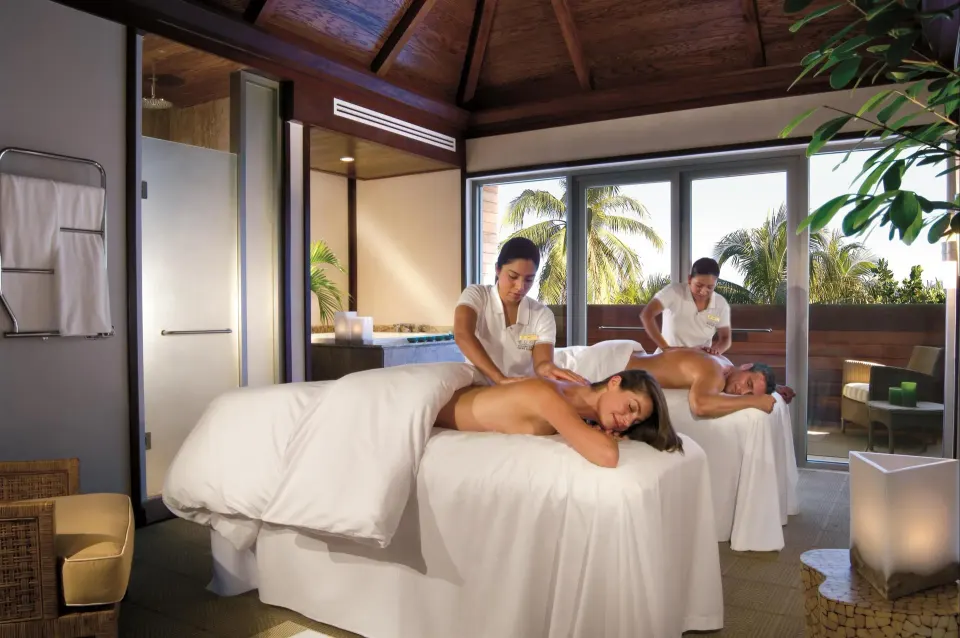 Spa treatment room with two massage tables at Fairmont Heritage Place Mayakoba.