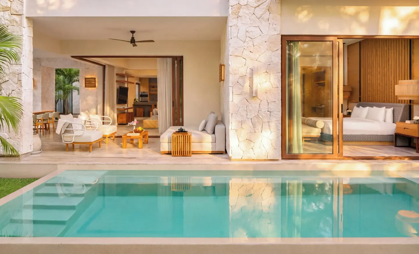 Garden villa exterior with pool, terrace, and bedroom at Fairmont Heritage Place Mayakoba.