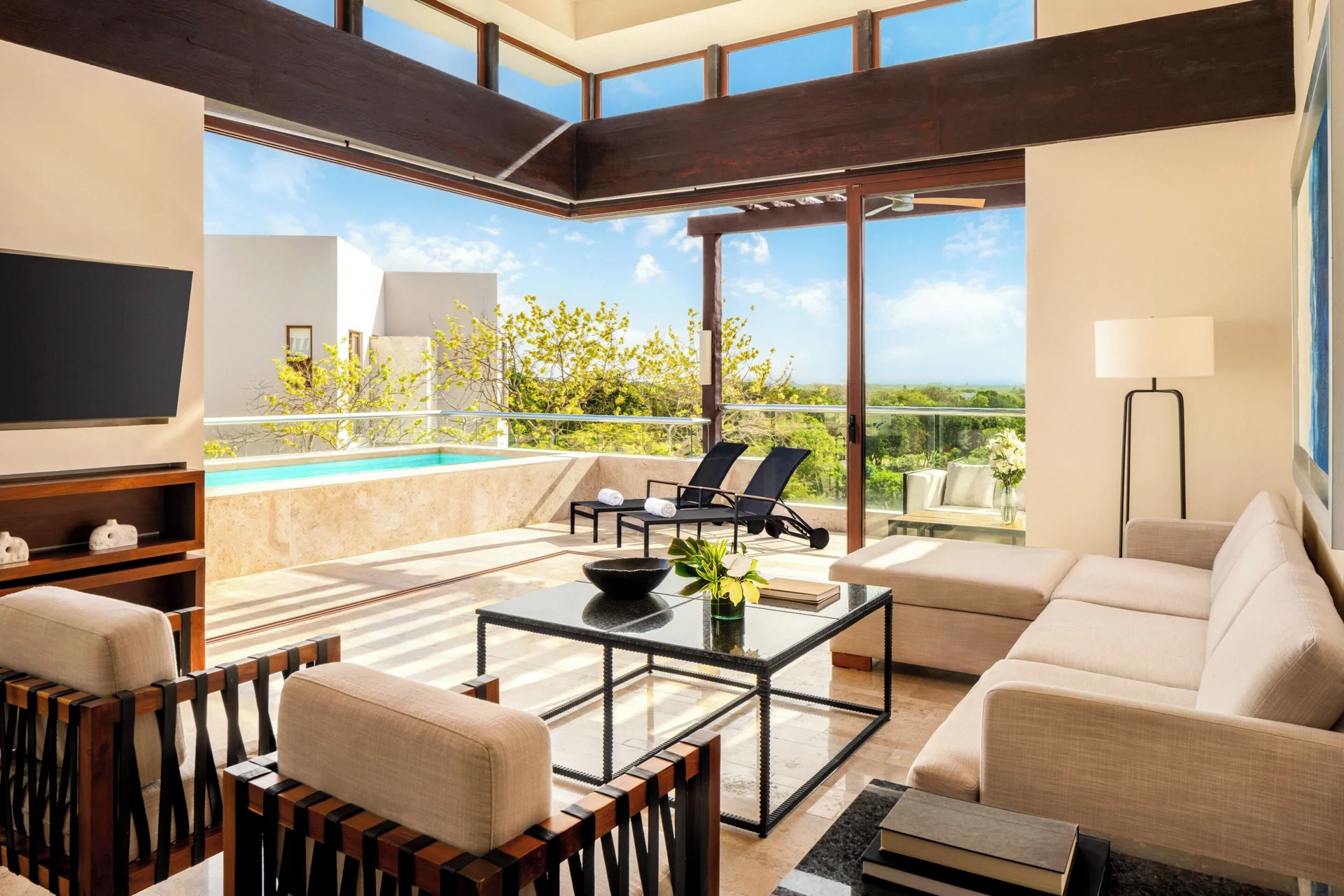 Penthouse villa living room and terrace pool at Fairmont Heritage Place Mayakoba.