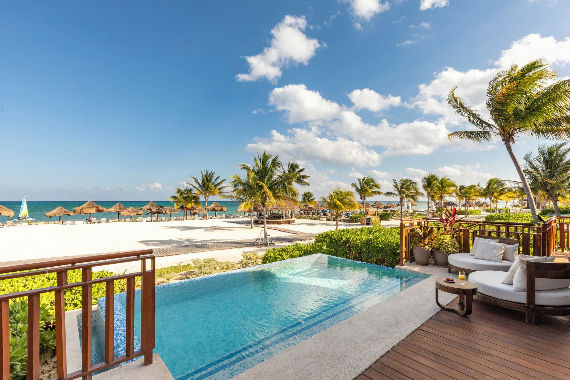 Premium Suite beachfront plunge pool and deck overlooking the beach at Fairmont Mayakoba.