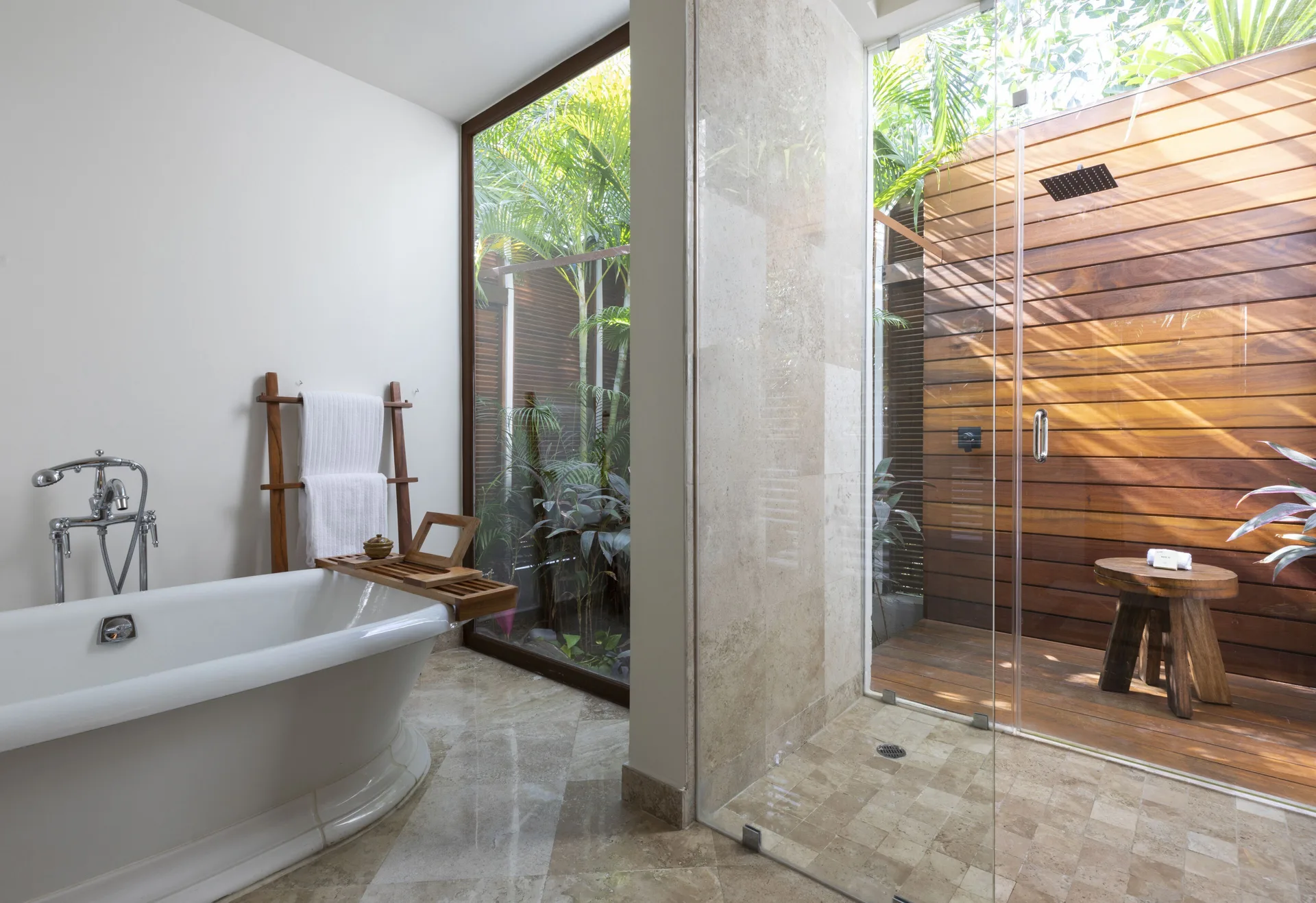 Presidential Suite bathroom with soaking tub and glass shower at Fairmont Mayakoba.