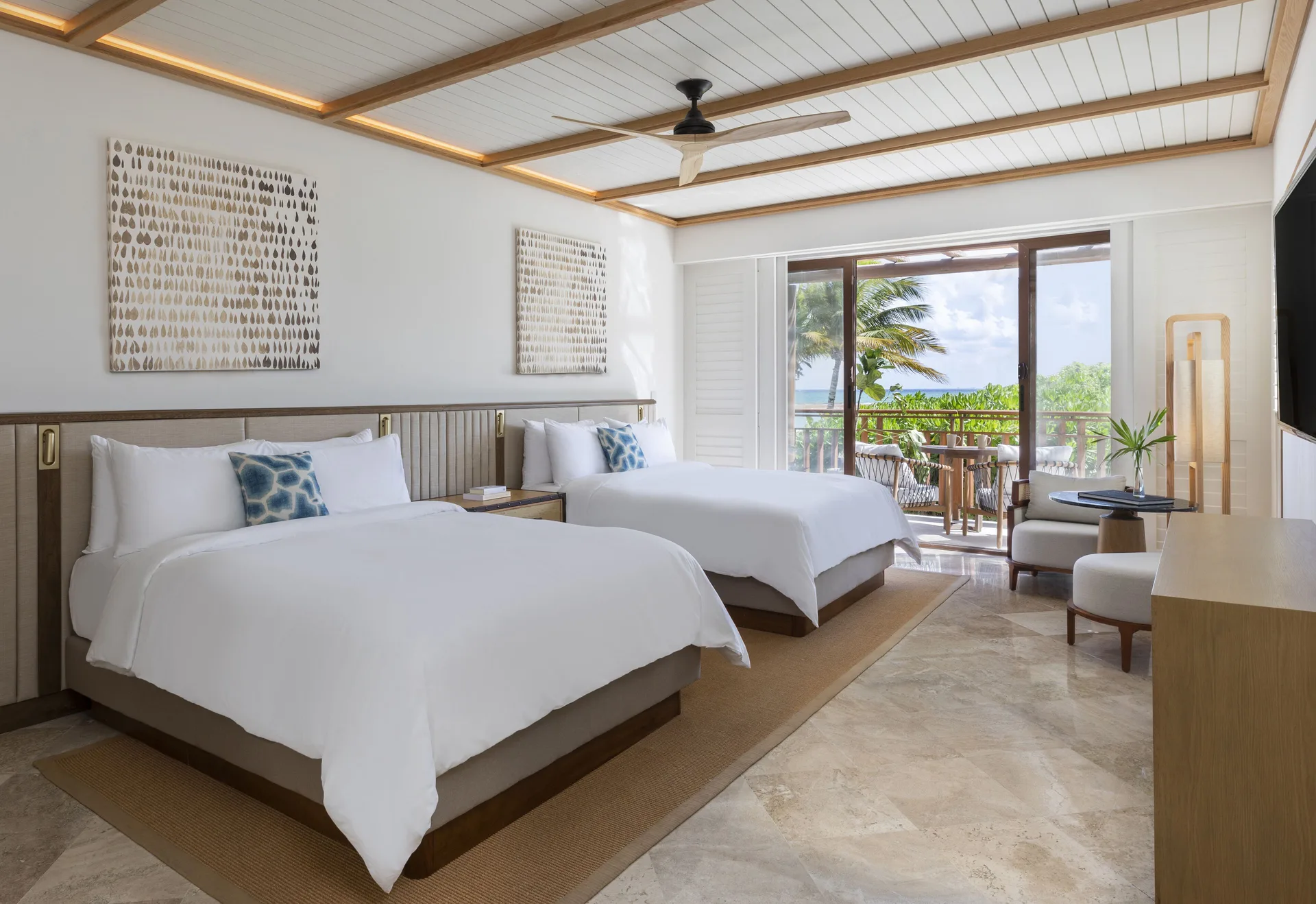 Presidential Suite double-bed room with balcony and ocean view at Fairmont Mayakoba.