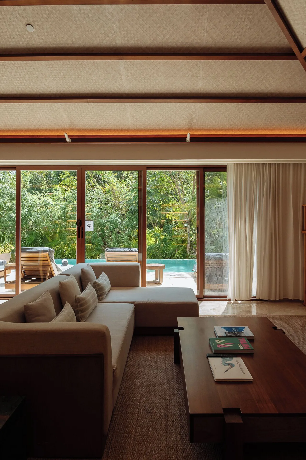 Presidential Suite living room and pool terrace at Fairmont Mayakoba.