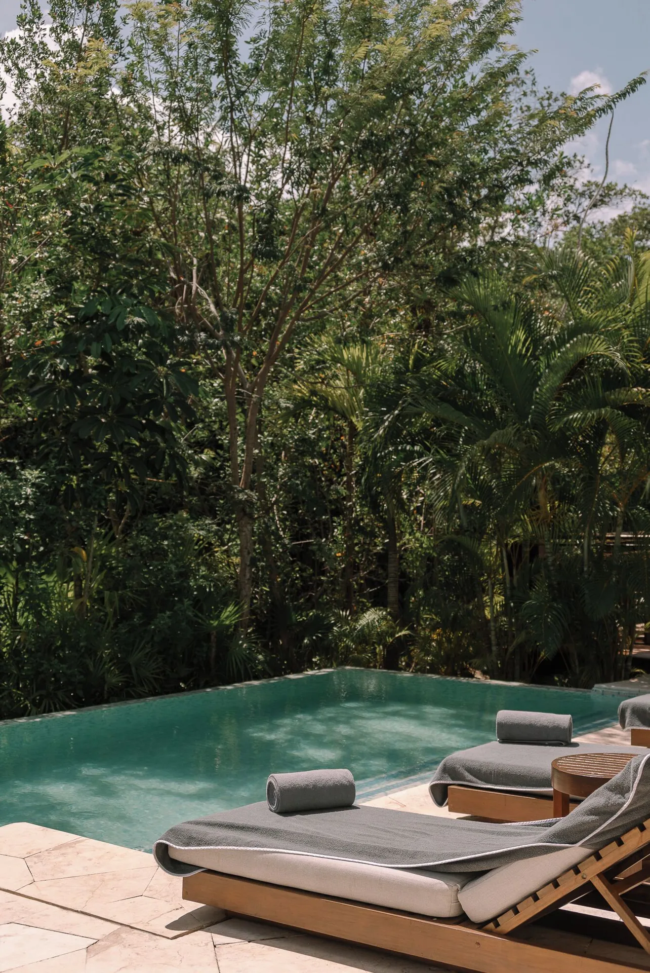 Presidential Suite private pool with lounge chairs at Fairmont Mayakoba.