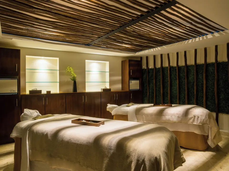 Spa treatment room with two massage tables at Fiesta Americana Cancun Villas.