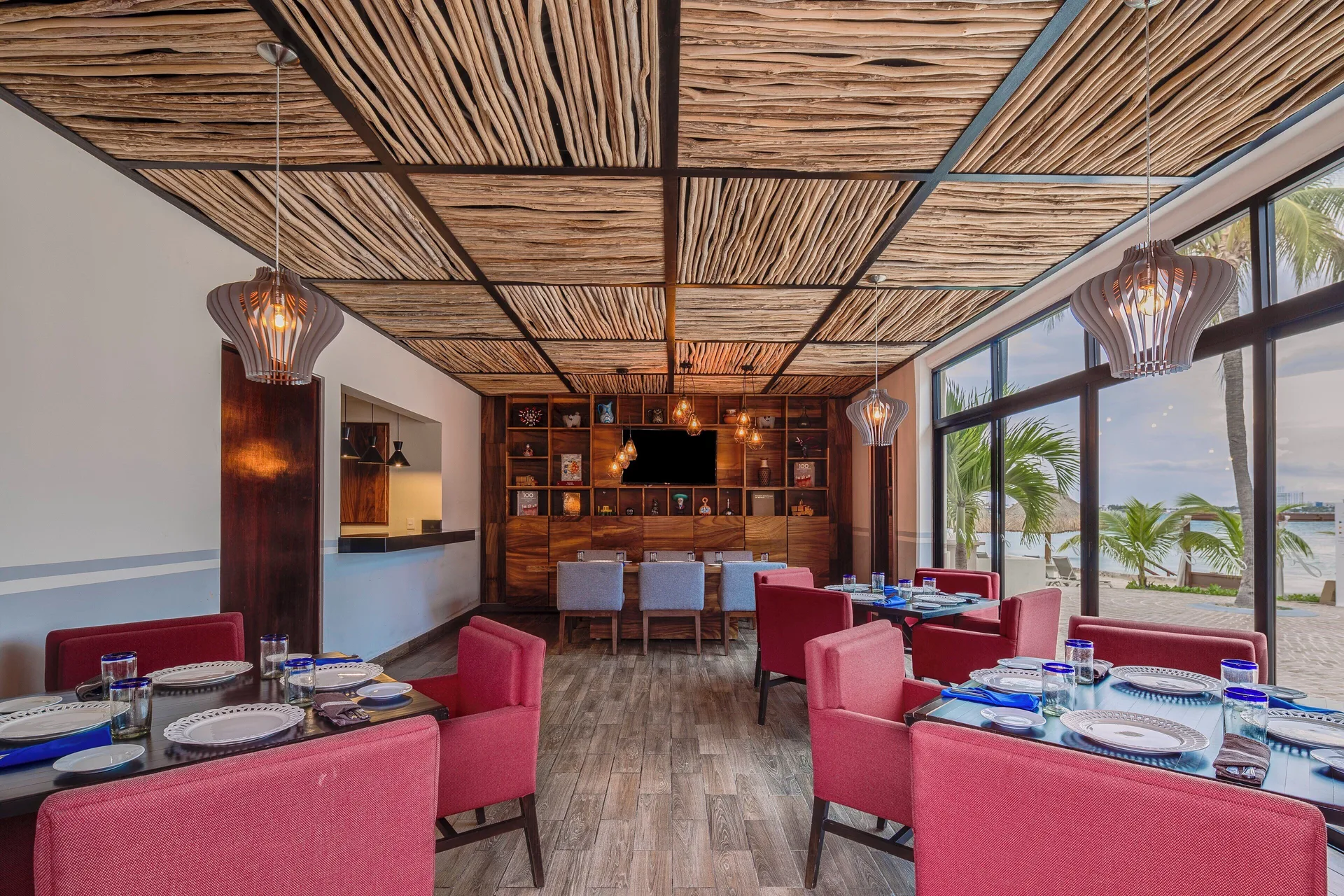 El Mexicano dining room with ocean-facing windows at Fiesta Americana Cancun Villas.