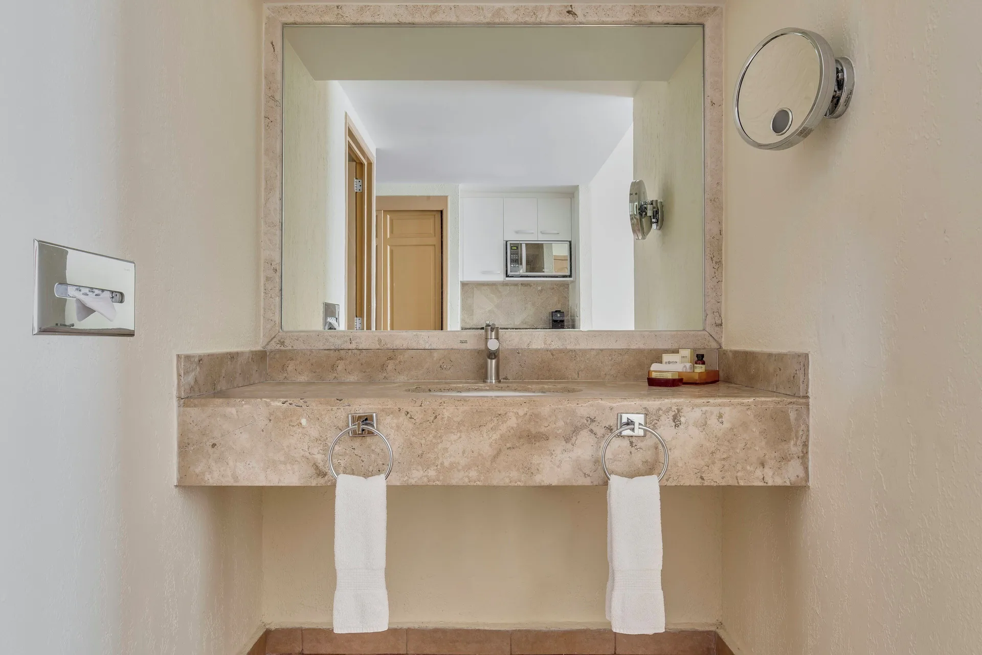 Deluxe Villa bathroom vanity with large mirror at Fiesta Americana Cancun Villas.