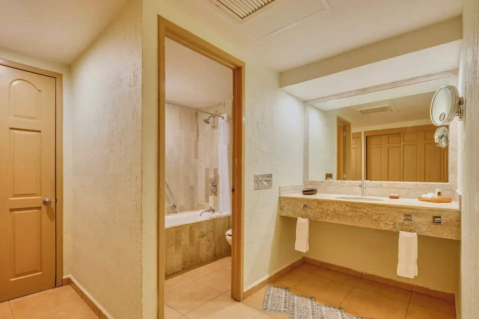Deluxe Villa bathroom vanity and tub area at Fiesta Americana Cancun Villas.