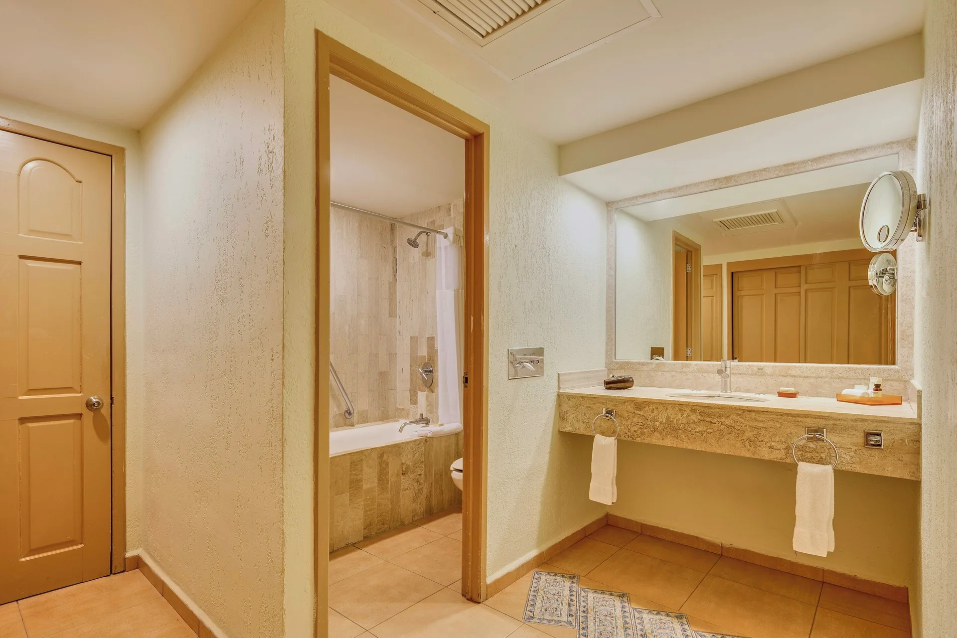 Deluxe Villa bathroom vanity and tub area at Fiesta Americana Cancun Villas.