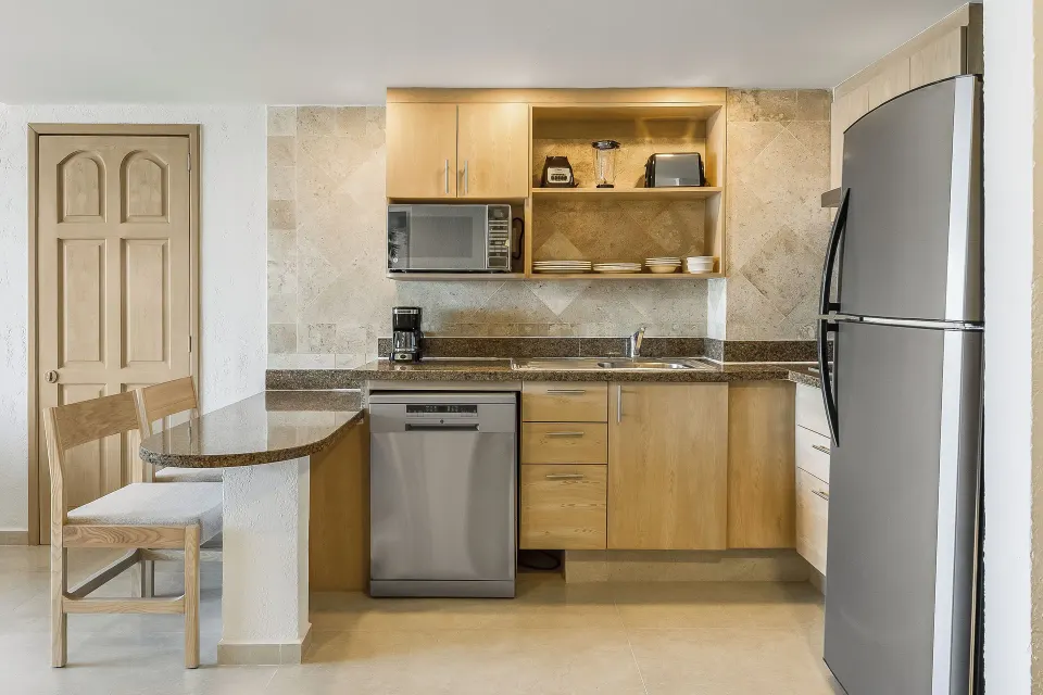 Premium Villa Master Suite kitchen with appliances at Fiesta Americana Cancun Villas.