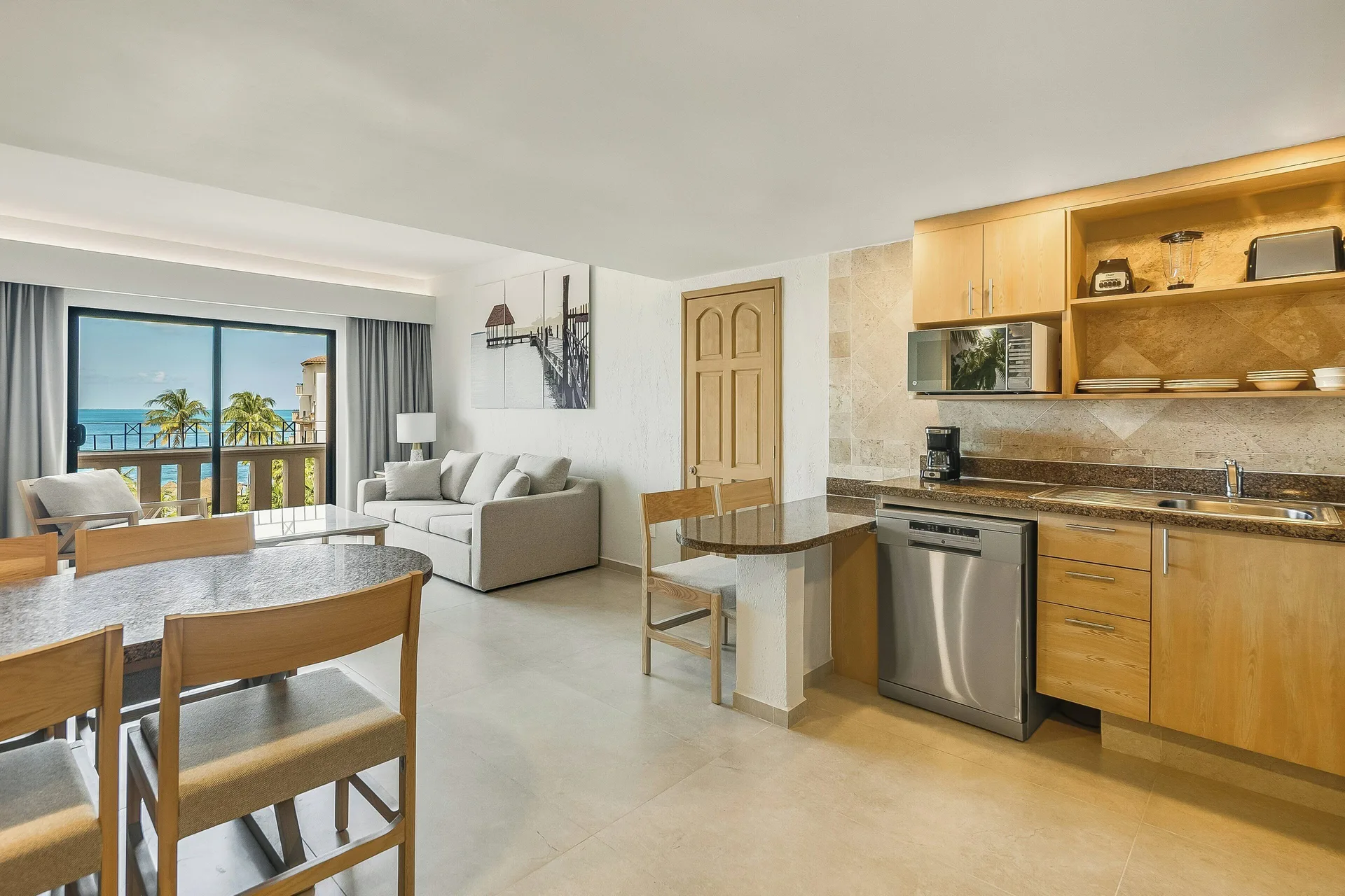 Premium Villa Master Suite kitchen and living room at Fiesta Americana Cancun Villas.