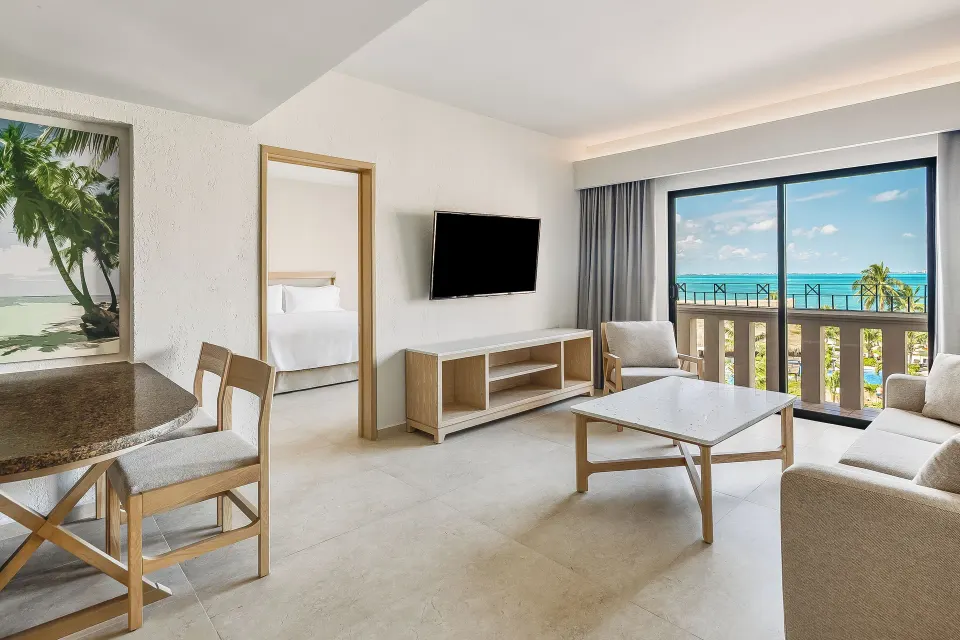 Premium Villa Master Suite living room with balcony view at Fiesta Americana Cancun Villas.