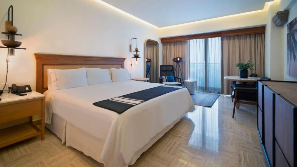 Governor Suite at Fiesta Americana Puerto Vallarta & Spa with king bed and spacious suite layout.