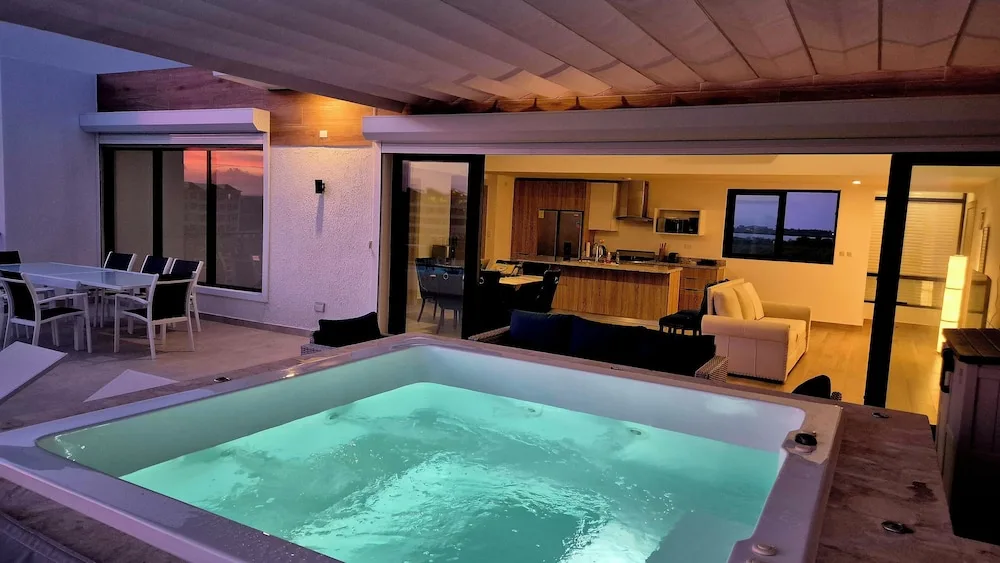 Luxury Beach Penthouse Jacuzzi and Lagoon View Punta Cana rental with private terrace and scenic water views