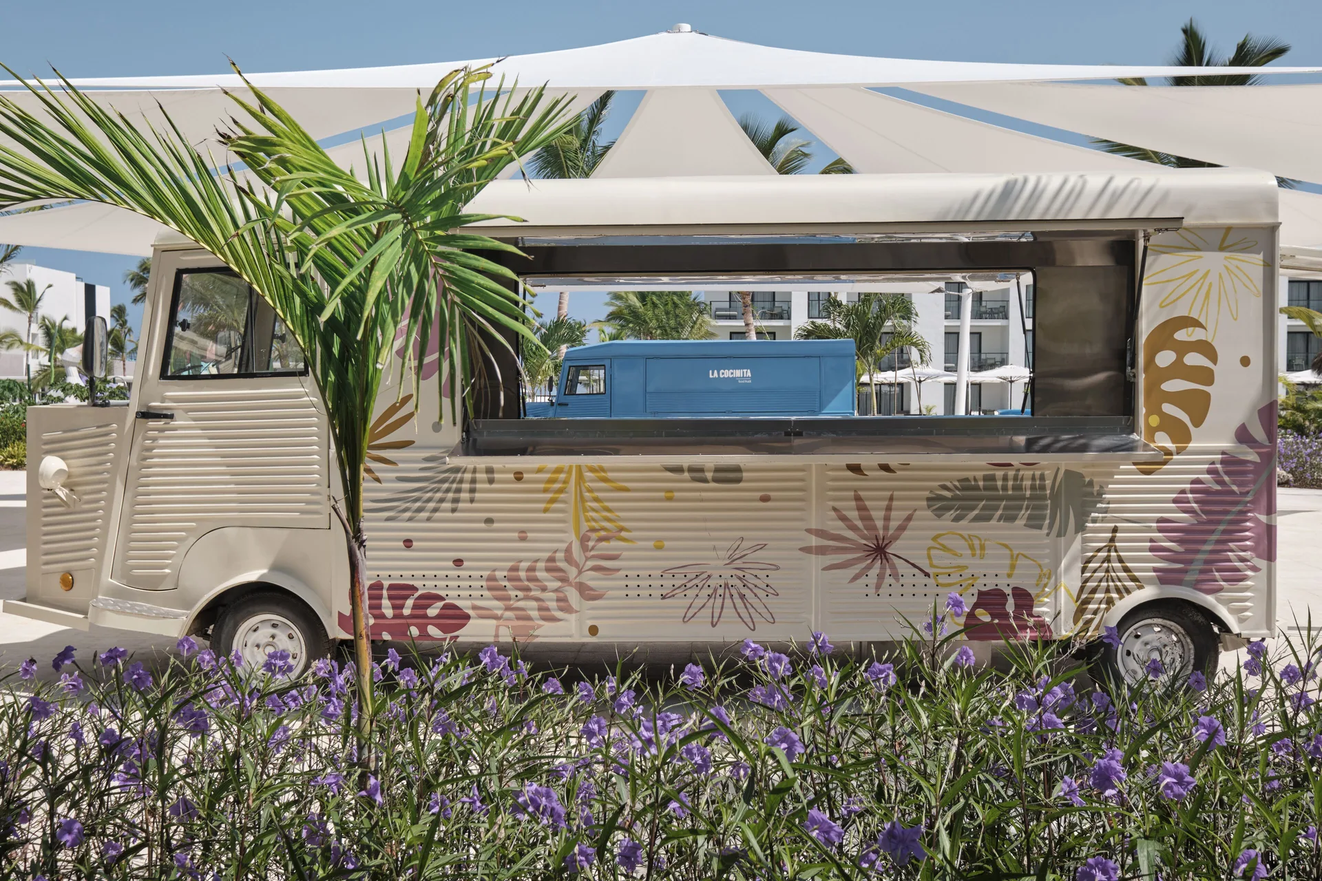 Cream floral food truck with purple flowers at Finest Punta Cana.