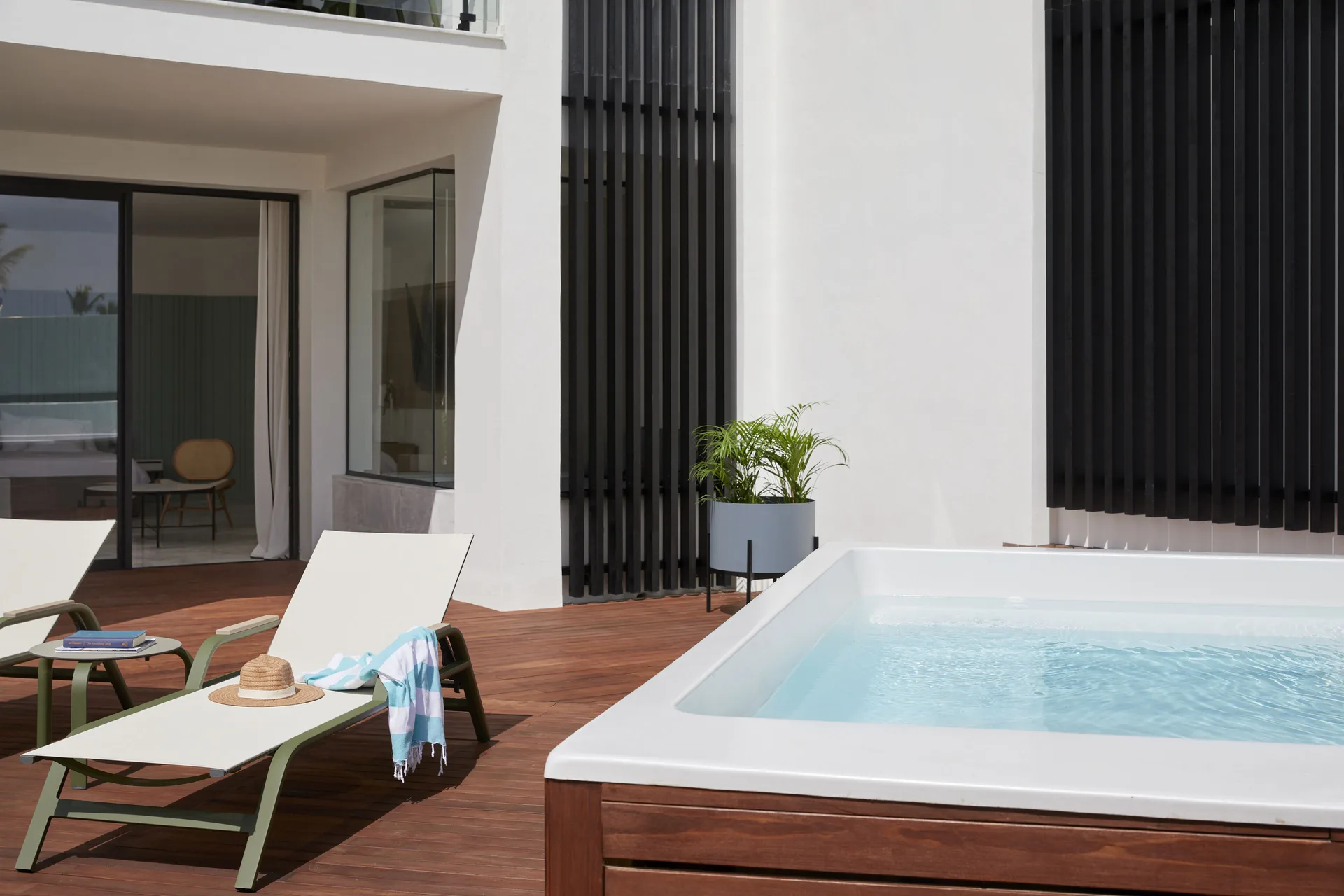 Private plunge pool and loungers on a Terrace Suite deck at Finest Punta Cana.