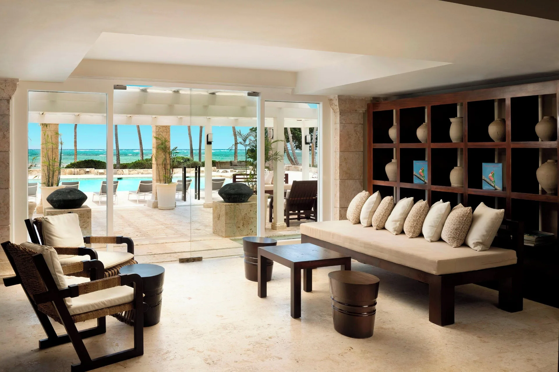 Lounge seating with terrace and ocean visible at Four Points Puntacana Village.