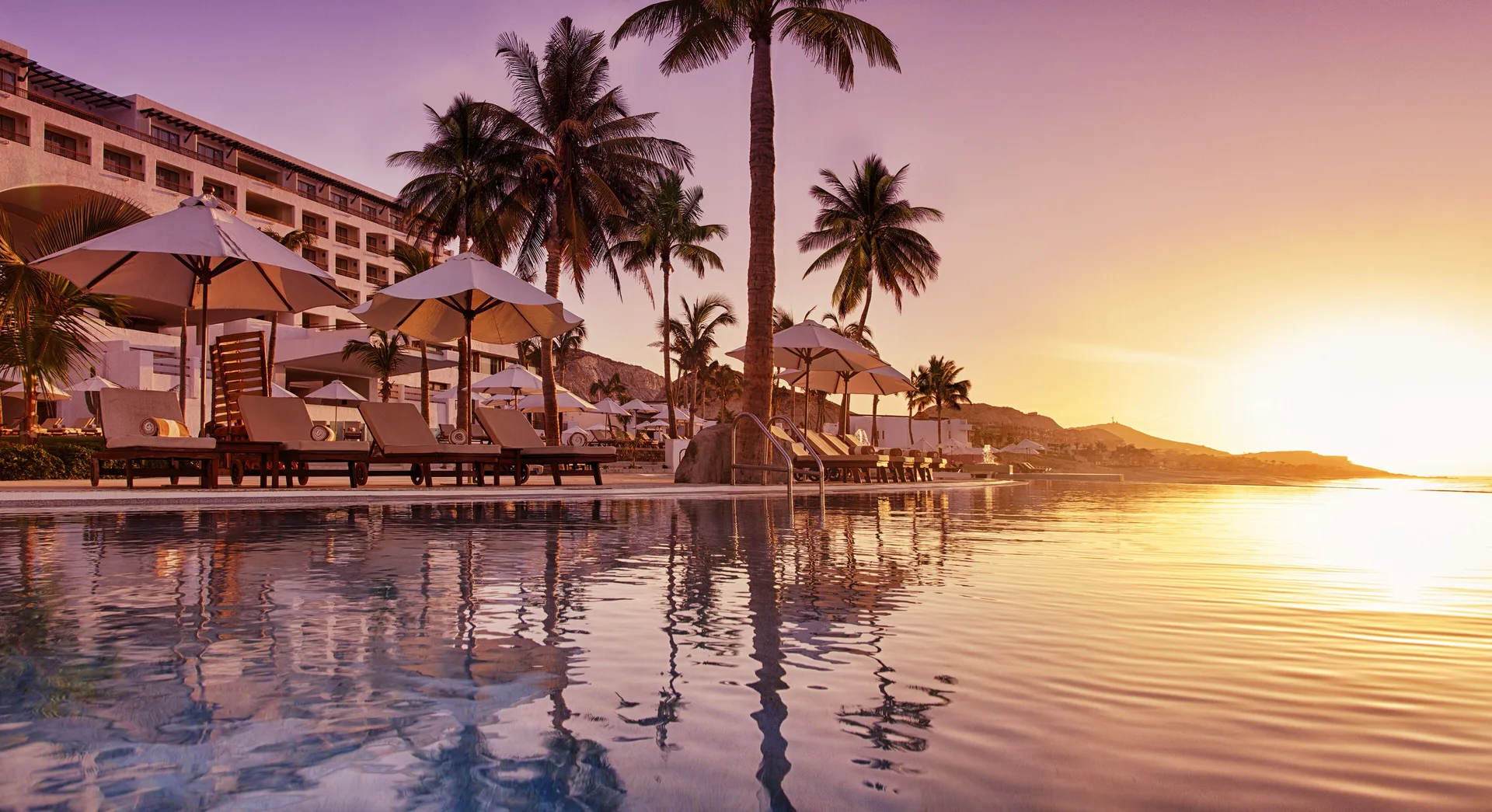 Marquis Los Cabos adults-only all-inclusive resort with beachfront pools and dramatic open-air lobby