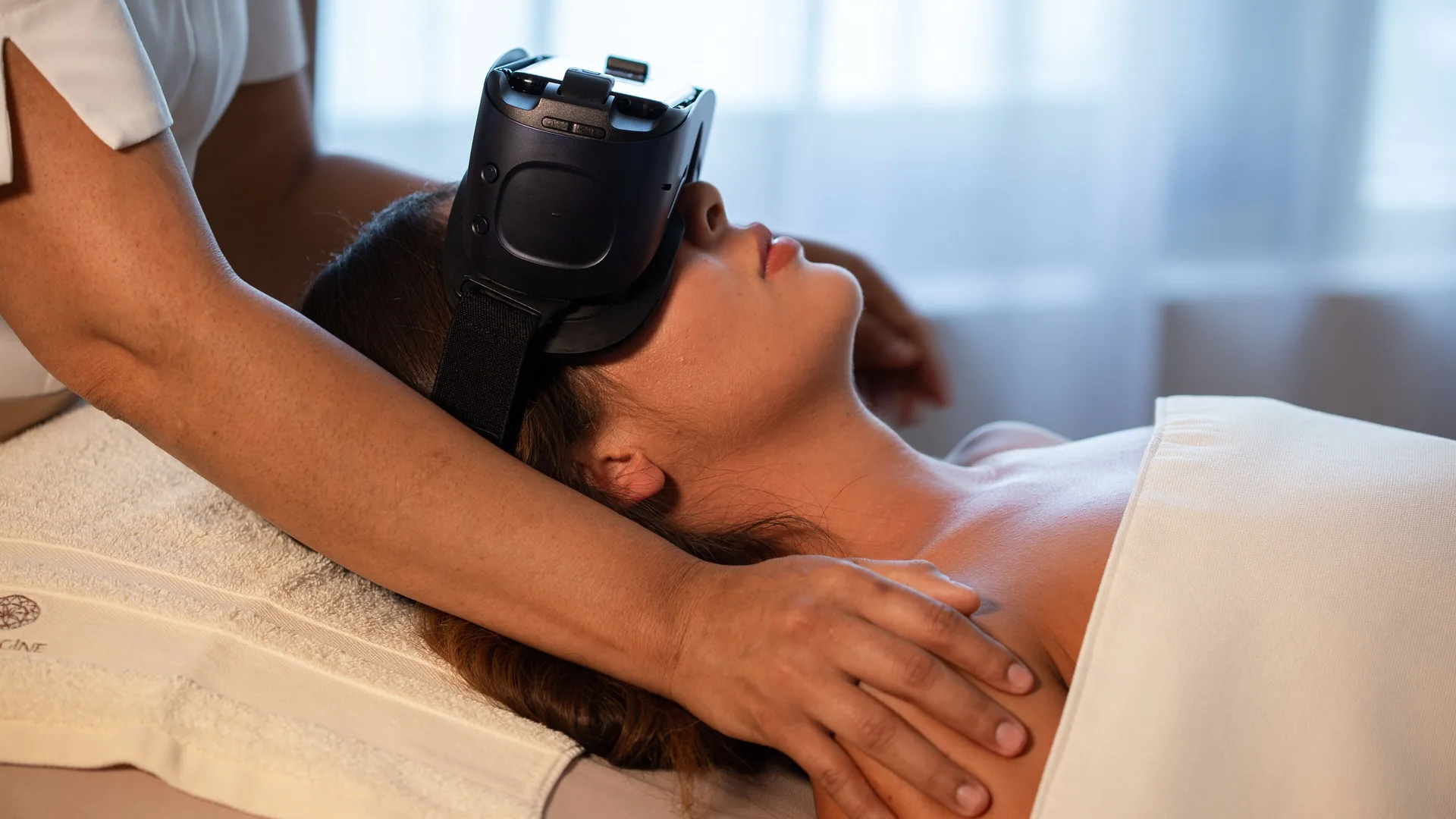 Guest wears a relaxation headset during a spa treatment at Garza Blanca Los Cabos.