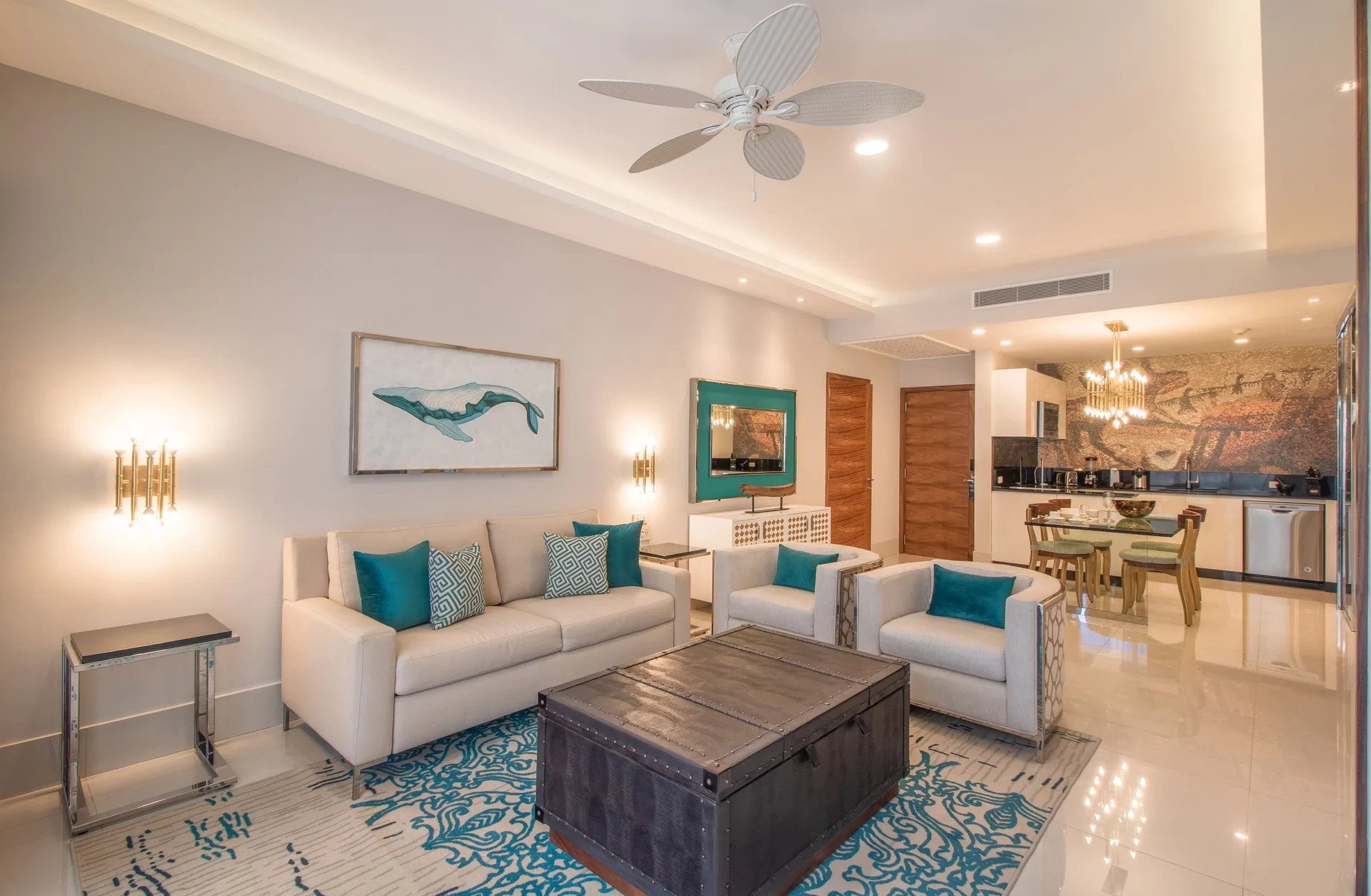 One Bedroom Suite living room and kitchen area at Garza Blanca Los Cabos.