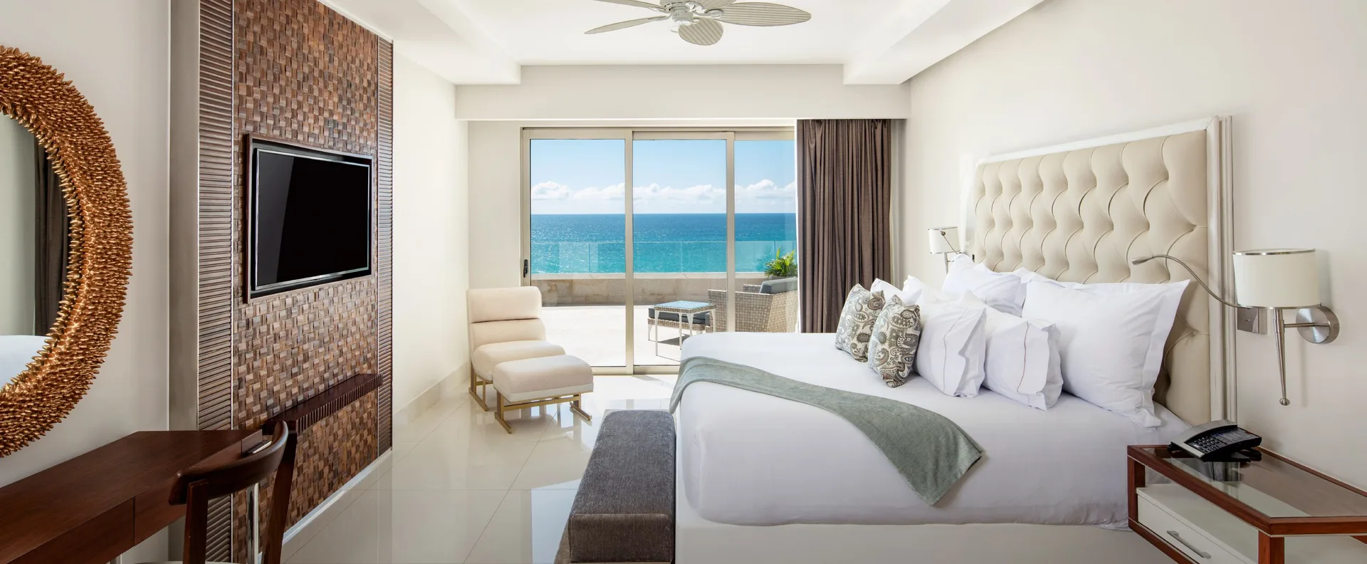 Junior Suite Ocean View king bed with balcony and sea view at Garza Blanca Los Cabos.