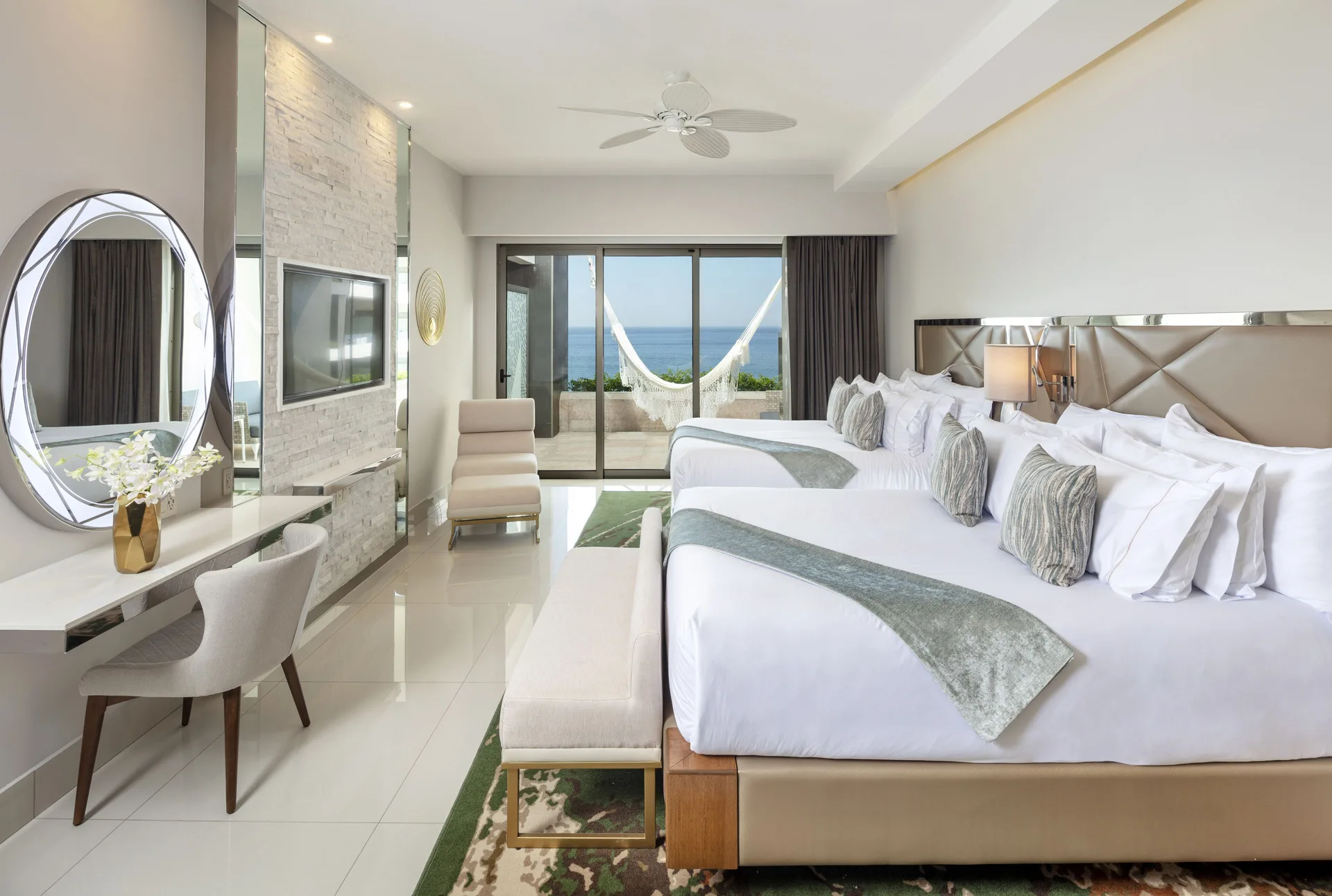 Junior Suite Ocean View with two beds and balcony hammock at Garza Blanca Los Cabos.