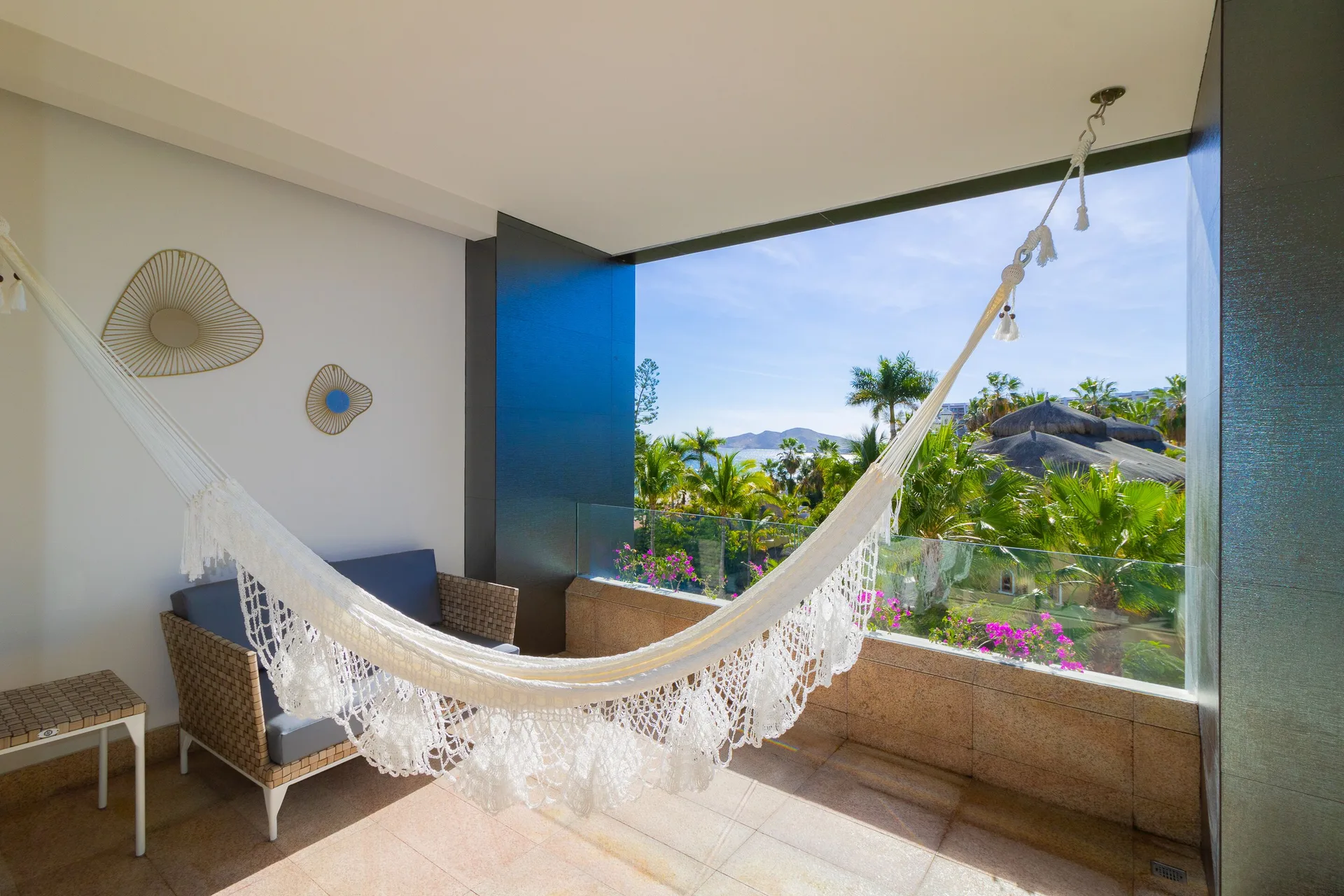 Junior Suite terrace hammock with tropical view at Garza Blanca Los Cabos.