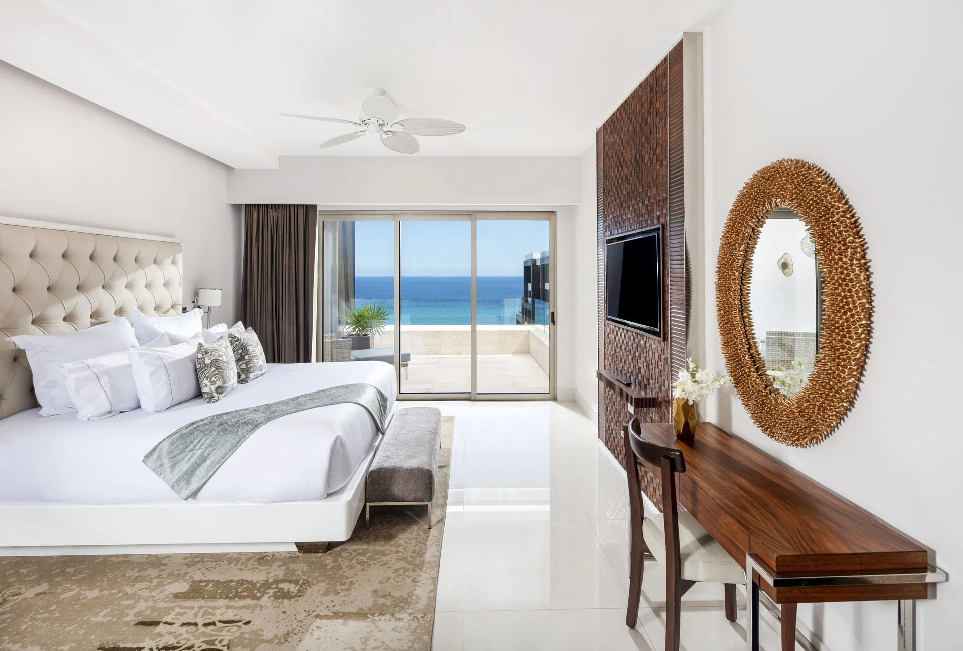 Loft Ocean View bedroom with king bed and balcony view at Garza Blanca Los Cabos.