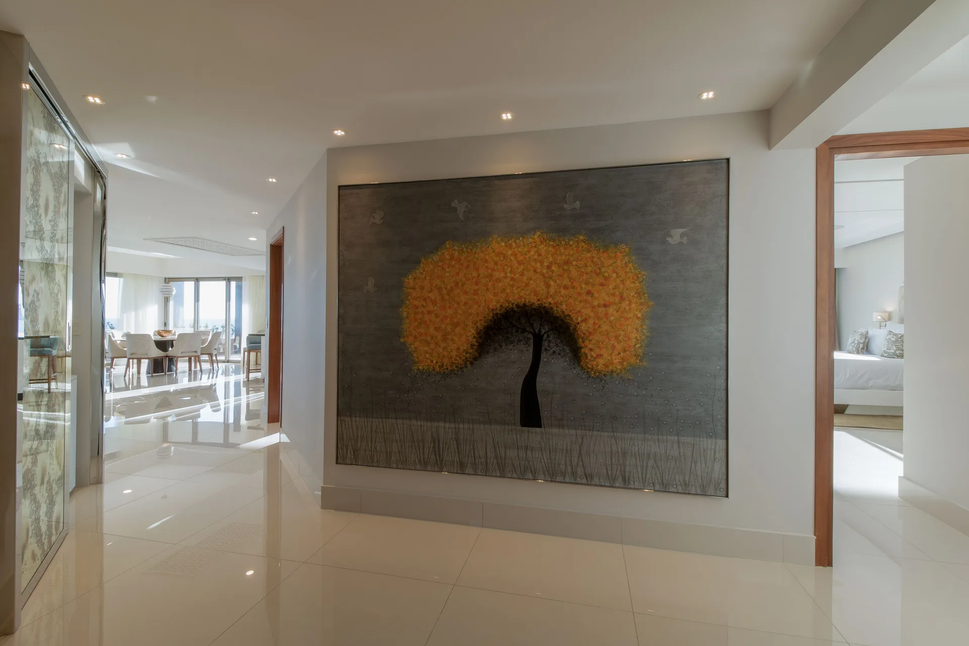Entry hall with artwork in a 3 Bedroom Ocean View Suite at Garza Blanca Los Cabos.