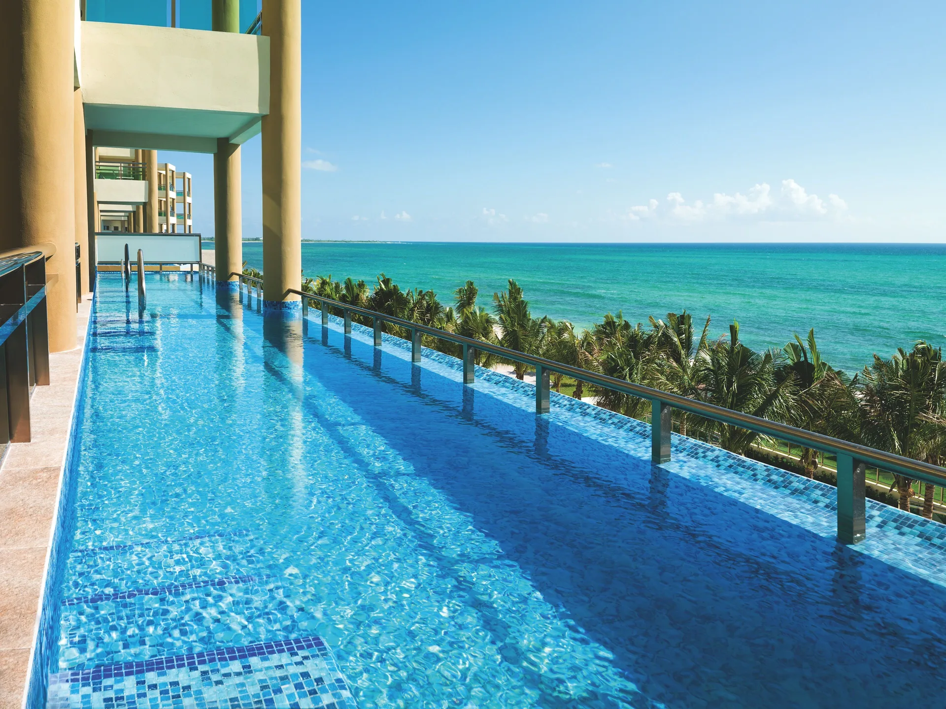 Oceanfront Swim Up Suite pool terrace overlooking the sea at Generations Riviera Maya.