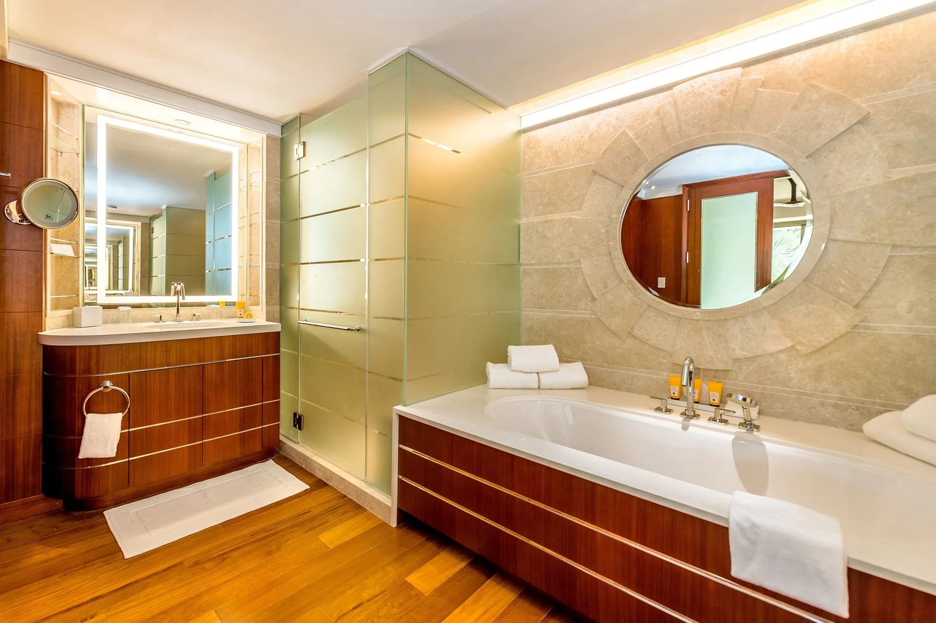 Guest room bathroom with soaking tub, shower and double vanity at Grand Hyatt Baha Mar.