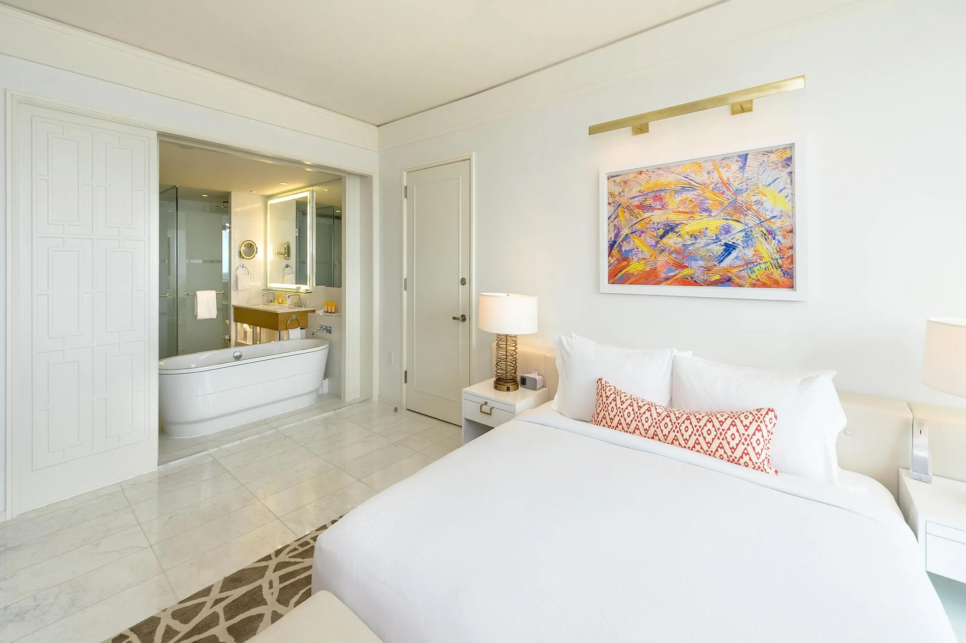 King bedroom with open bath and soaking tub at Grand Hyatt Baha Mar.