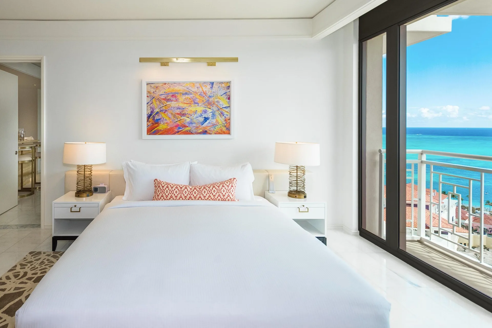 King bed ocean-view guest room with balcony at Grand Hyatt Baha Mar.
