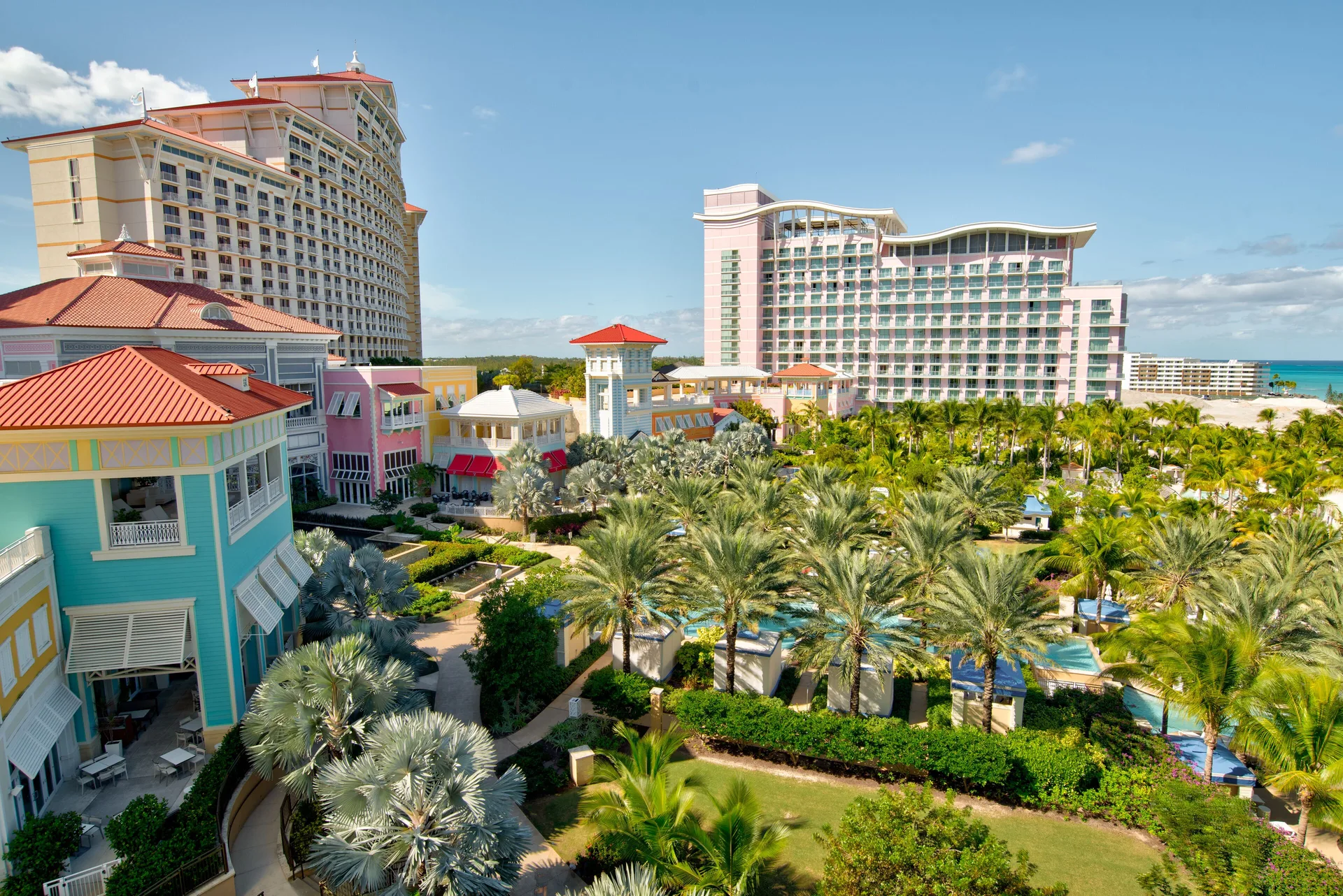 Resort towers, pastel buildings and palm-lined pools at Grand Hyatt Baha Mar.