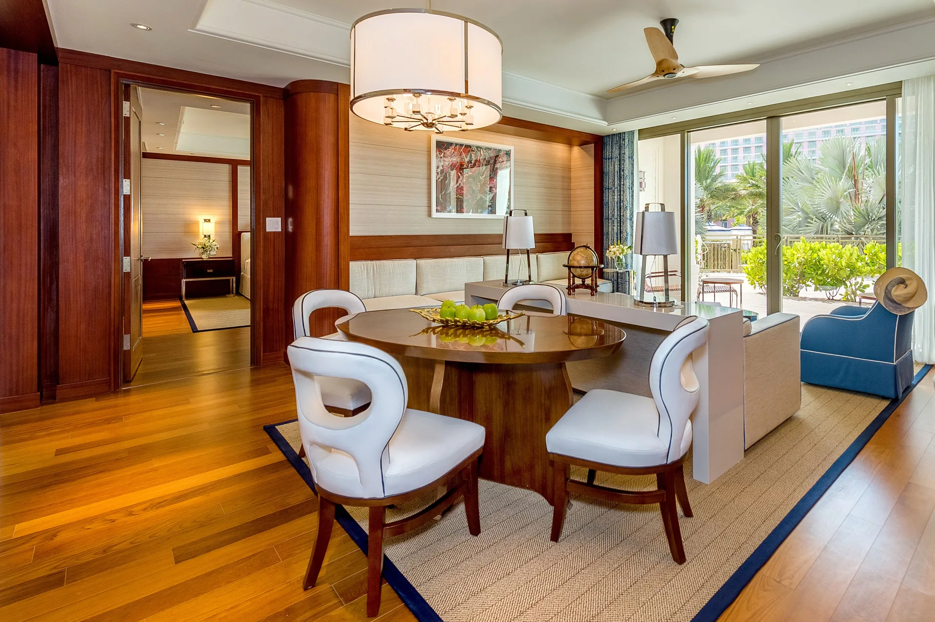 Wood-paneled suite dining and living room at Grand Hyatt Baha Mar.