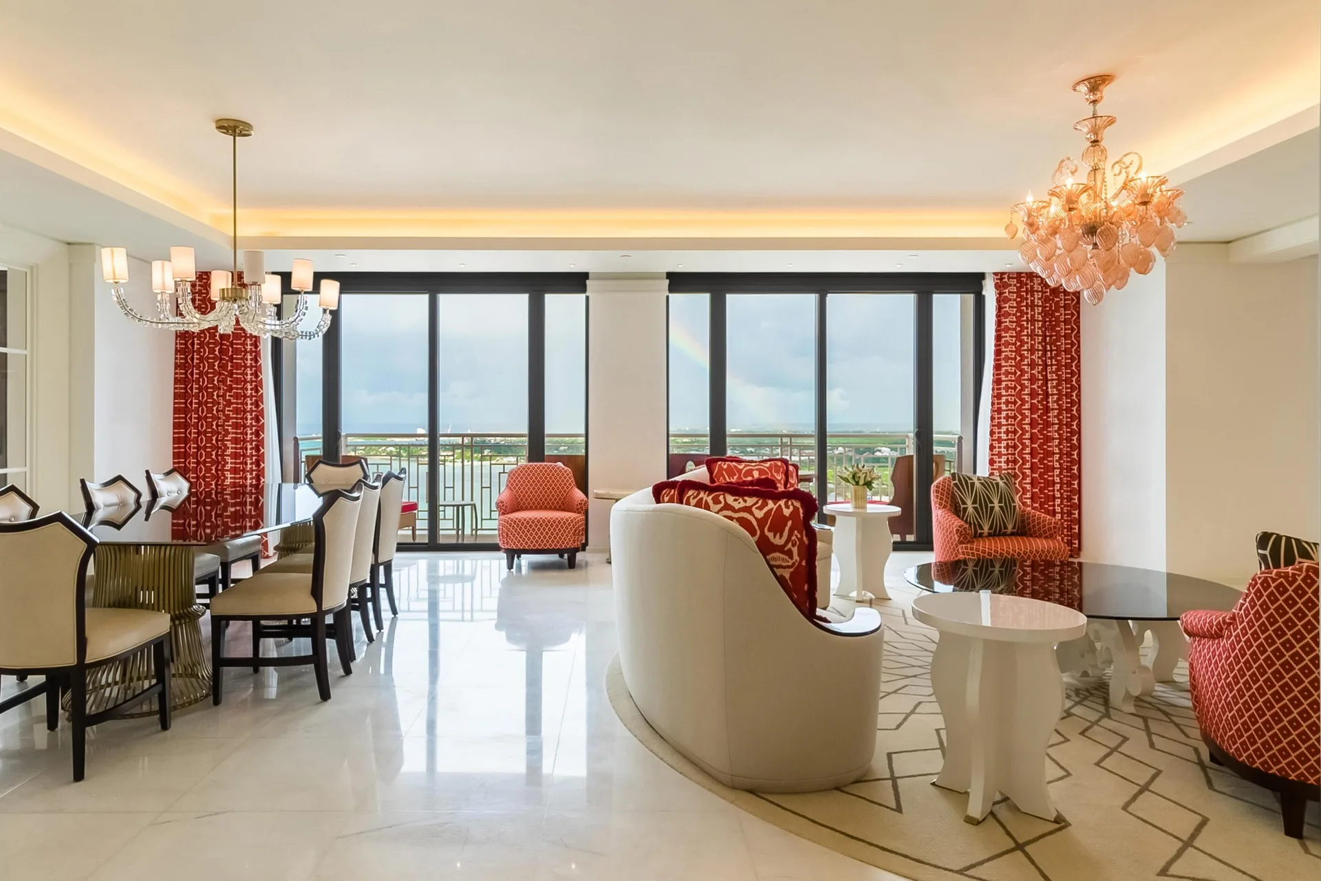 Suite living and dining area with balcony windows at Grand Hyatt Baha Mar.