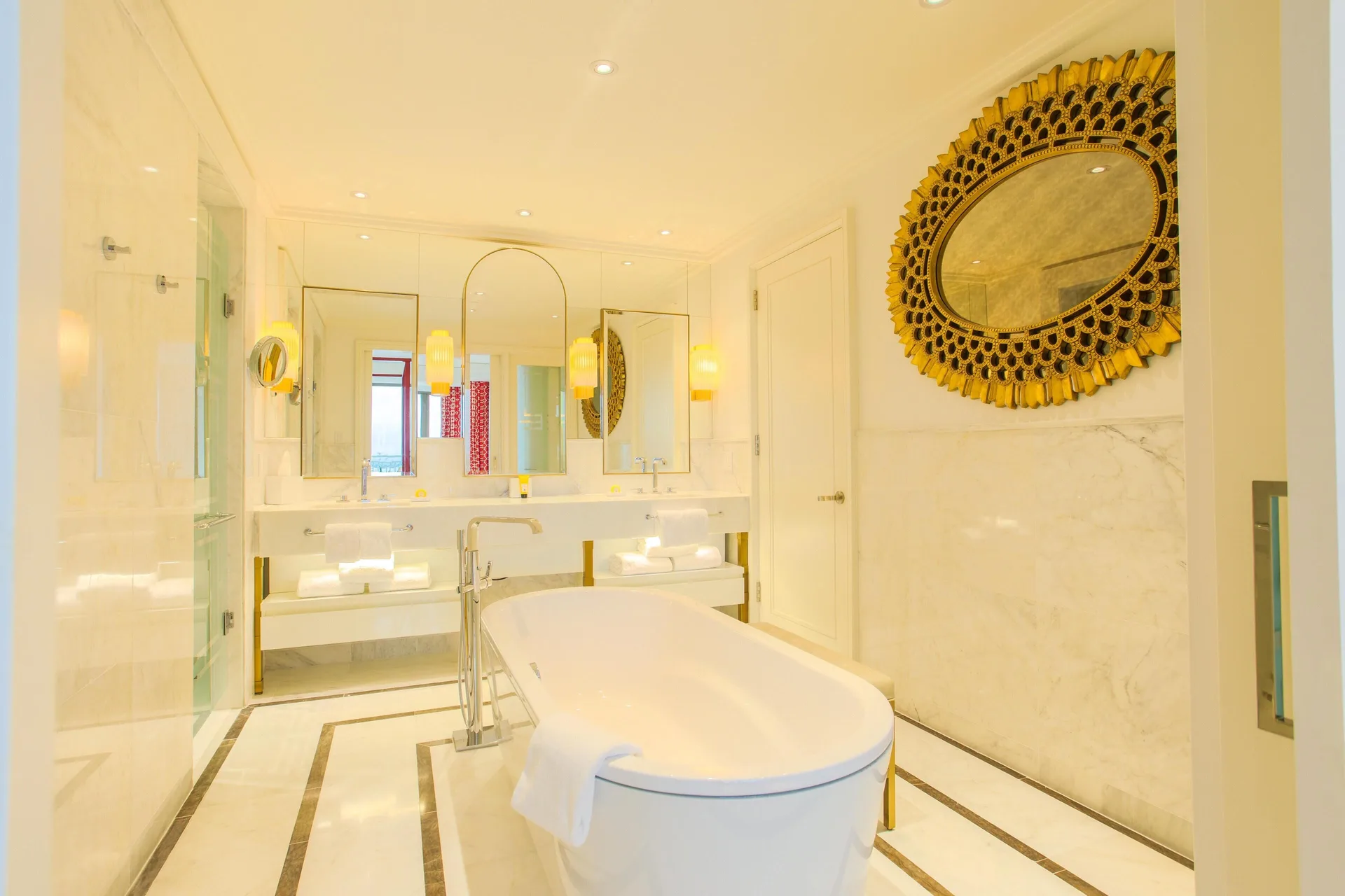 Marble bathroom with freestanding tub and double vanity at Grand Hyatt Baha Mar.