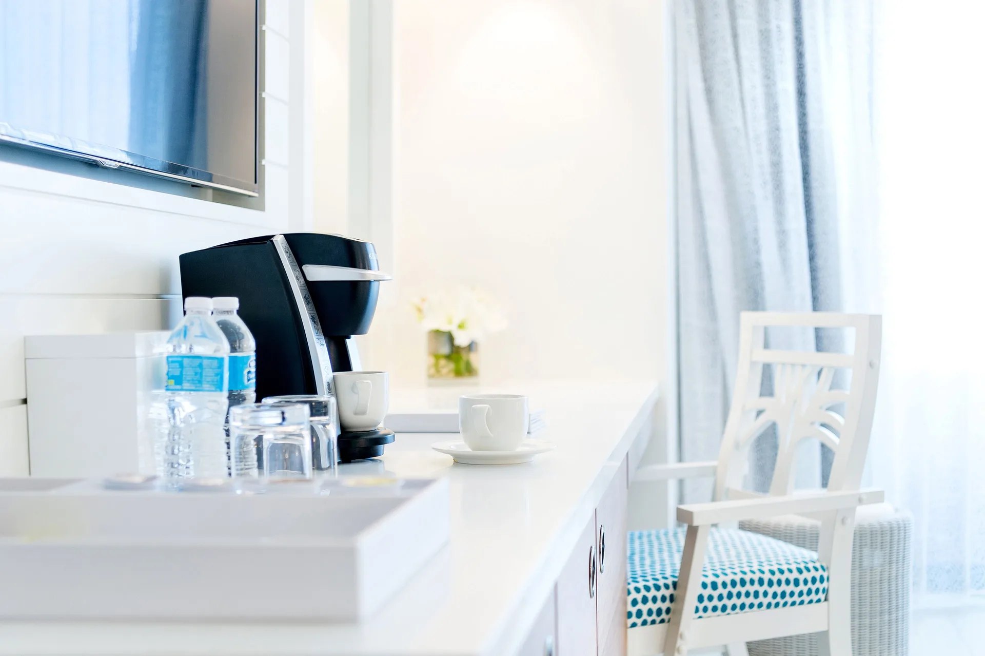 Coffee station and desk chair inside a residence room at Grand Hyatt Baha Mar.