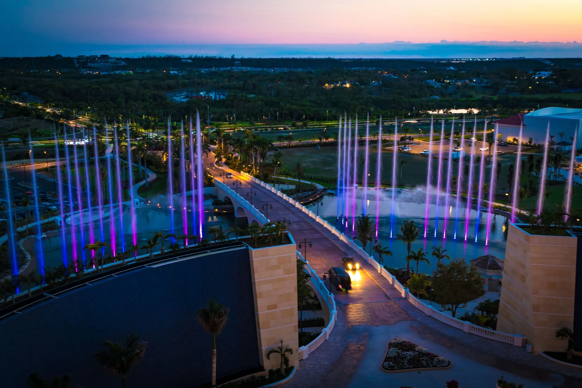 Evening fountain view with colored water jets from Grand Hyatt Baha Mar.