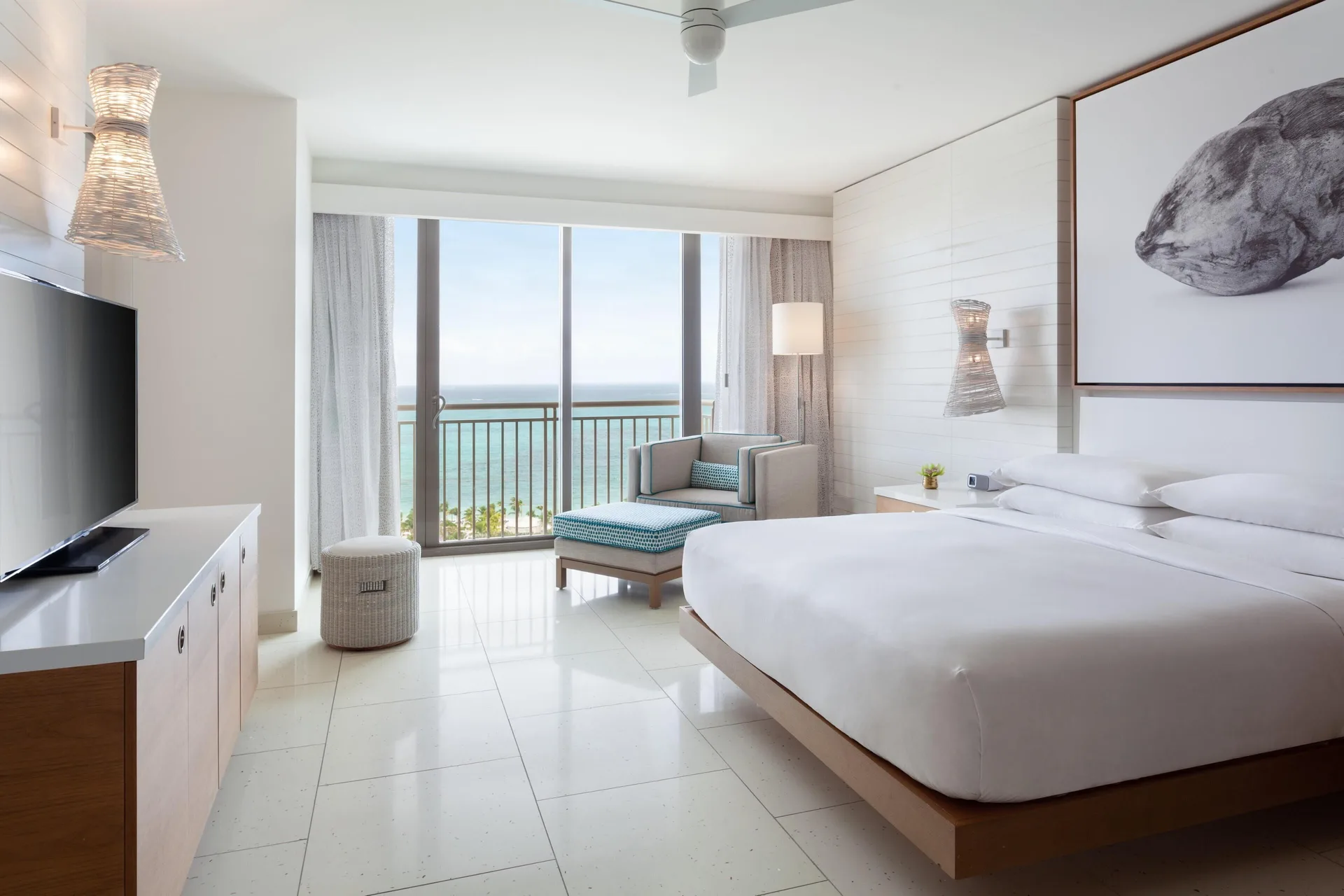 King bedroom with balcony ocean view in a residence at Grand Hyatt Baha Mar.