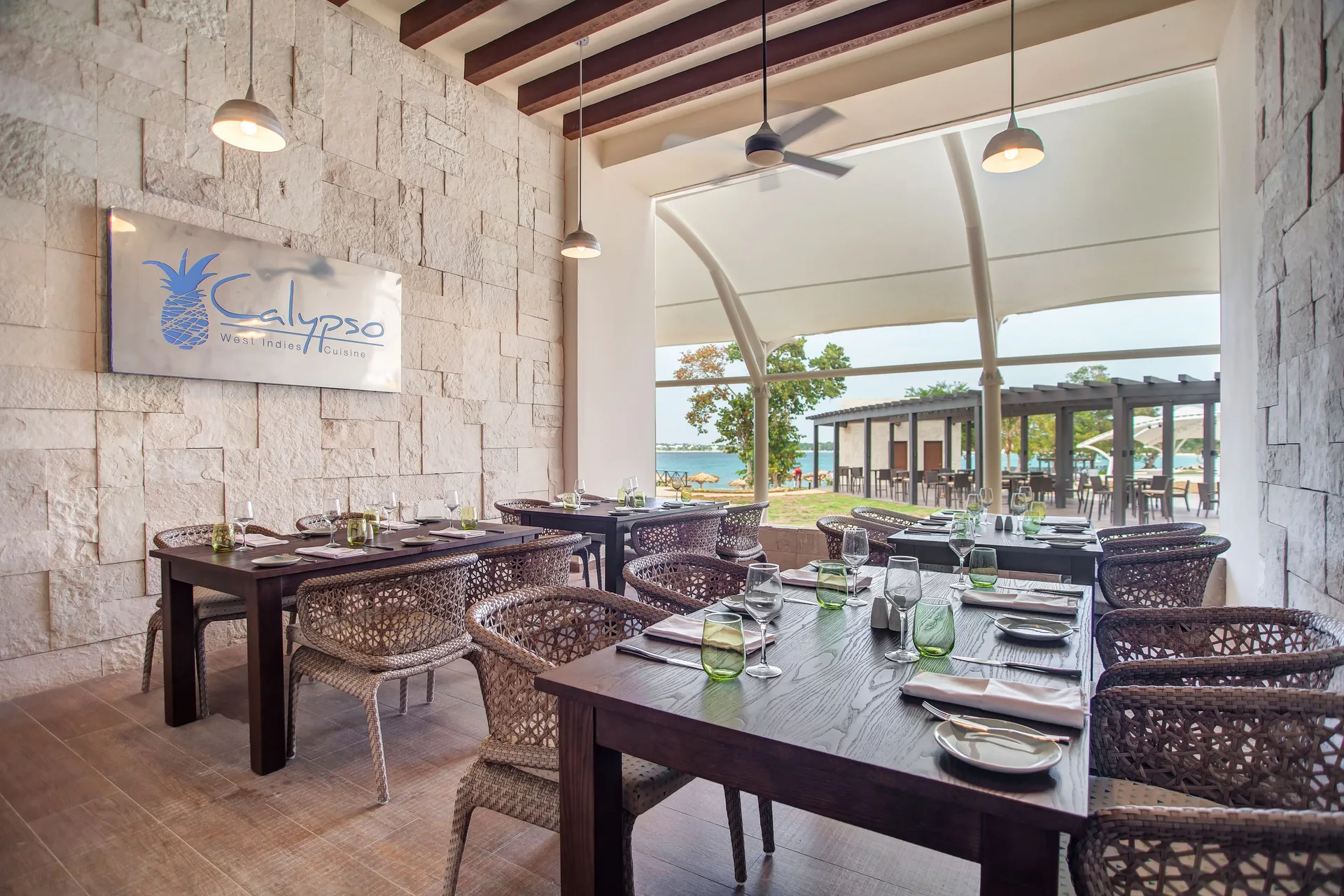 Calypso dining terrace with ocean glimpses at Grand Lido Negril Au-Naturel.